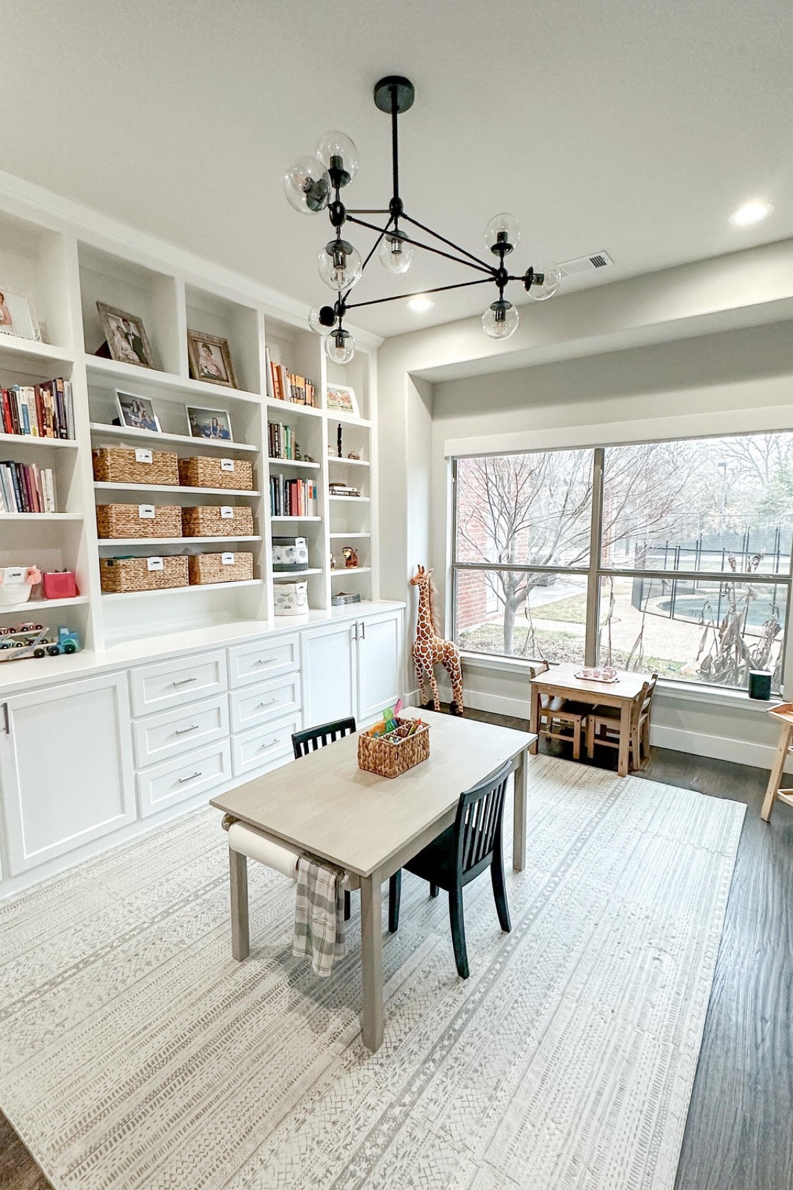 The @b.beautifullyorganized team knocked it out of the park with this one! ✨ 

Truly one of the best gifts we can give our kids is a clear + organized place to play! Kids thrive on structure (just like us!) and their playrooms should be no different! 

If you’re ready to take your kids playroom from chaotic and cluttered to a streamlined space they’ll LOVE, comment PLAYROOM and we’ll show you how we can help! 😊