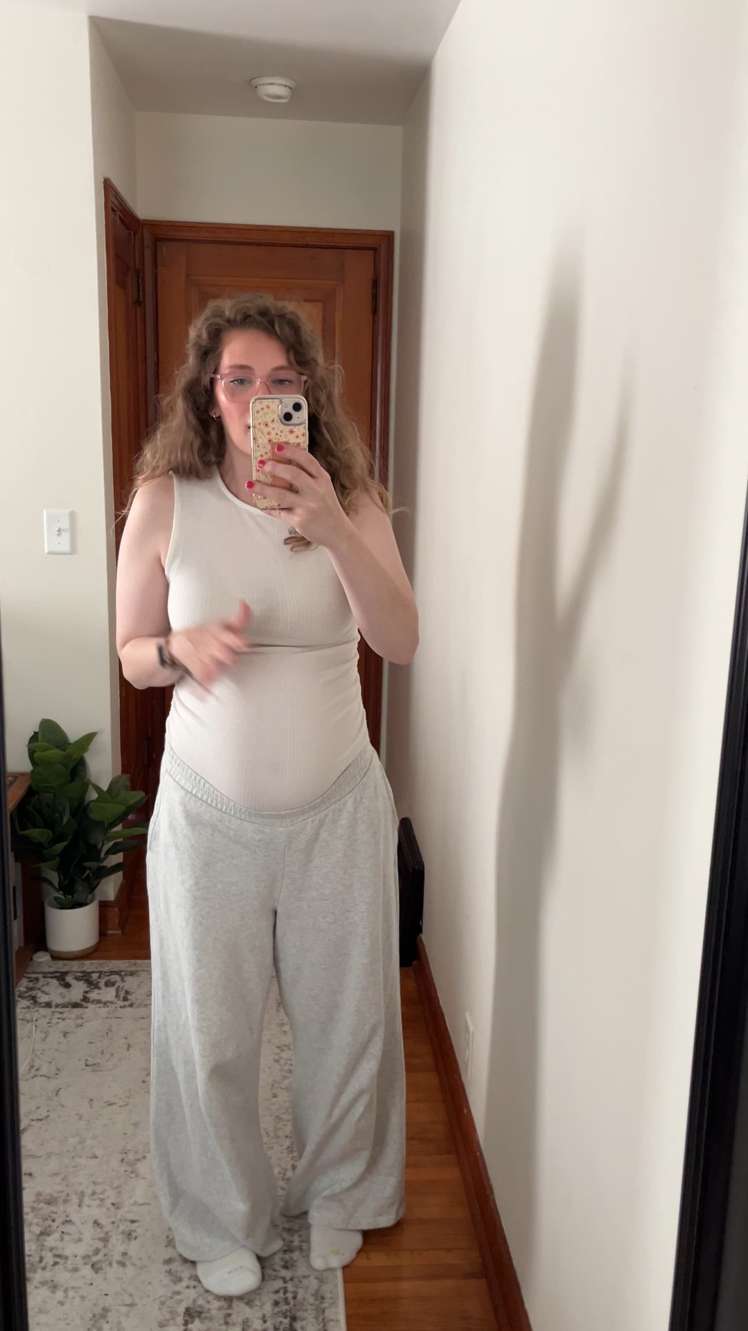 I love this tank! Love that it’s high neck, love the price, and love that it’s maternity and fits the bump! Got my true to size medium!!