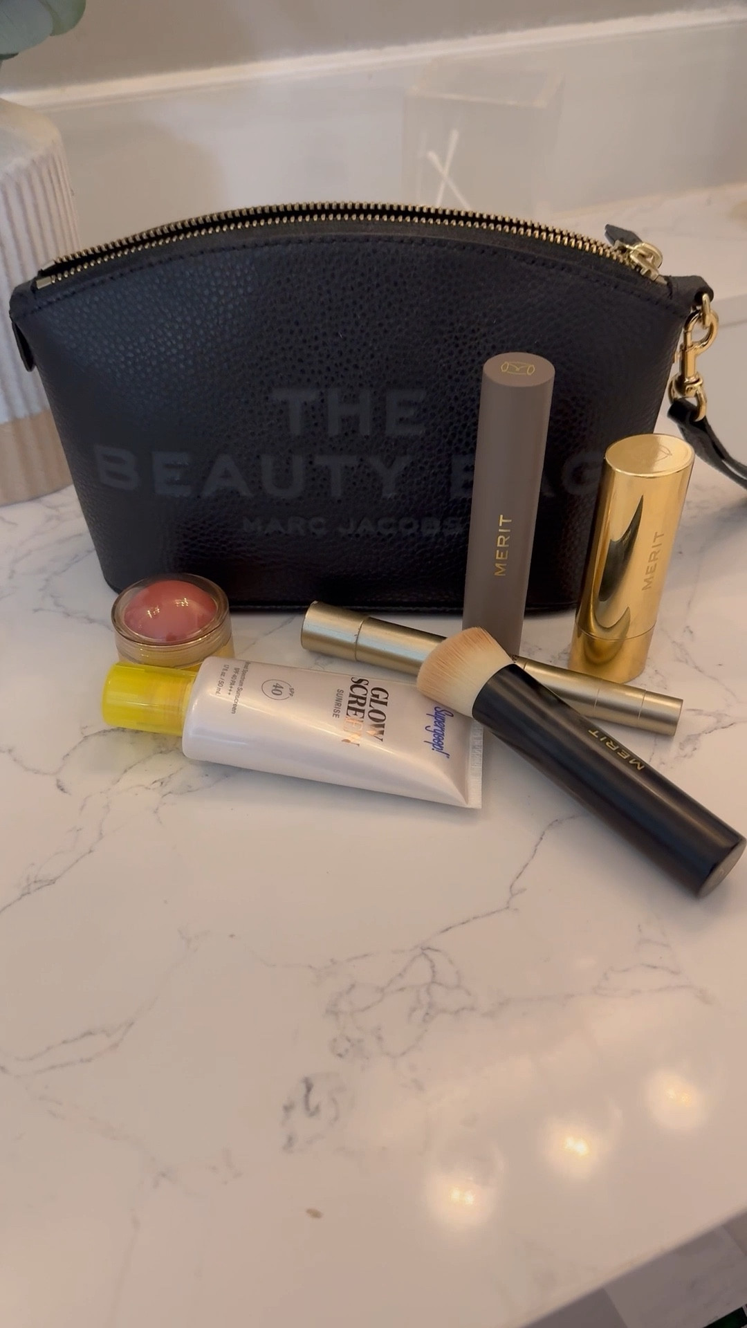 This Marc Jacobs beauty bag cosmetic bag makes a great gift and comes in multiple colors.  Perfect to hold my favorite beauty products 

#LTKGiftGuide #LTKBeauty #LTKmorningroutine