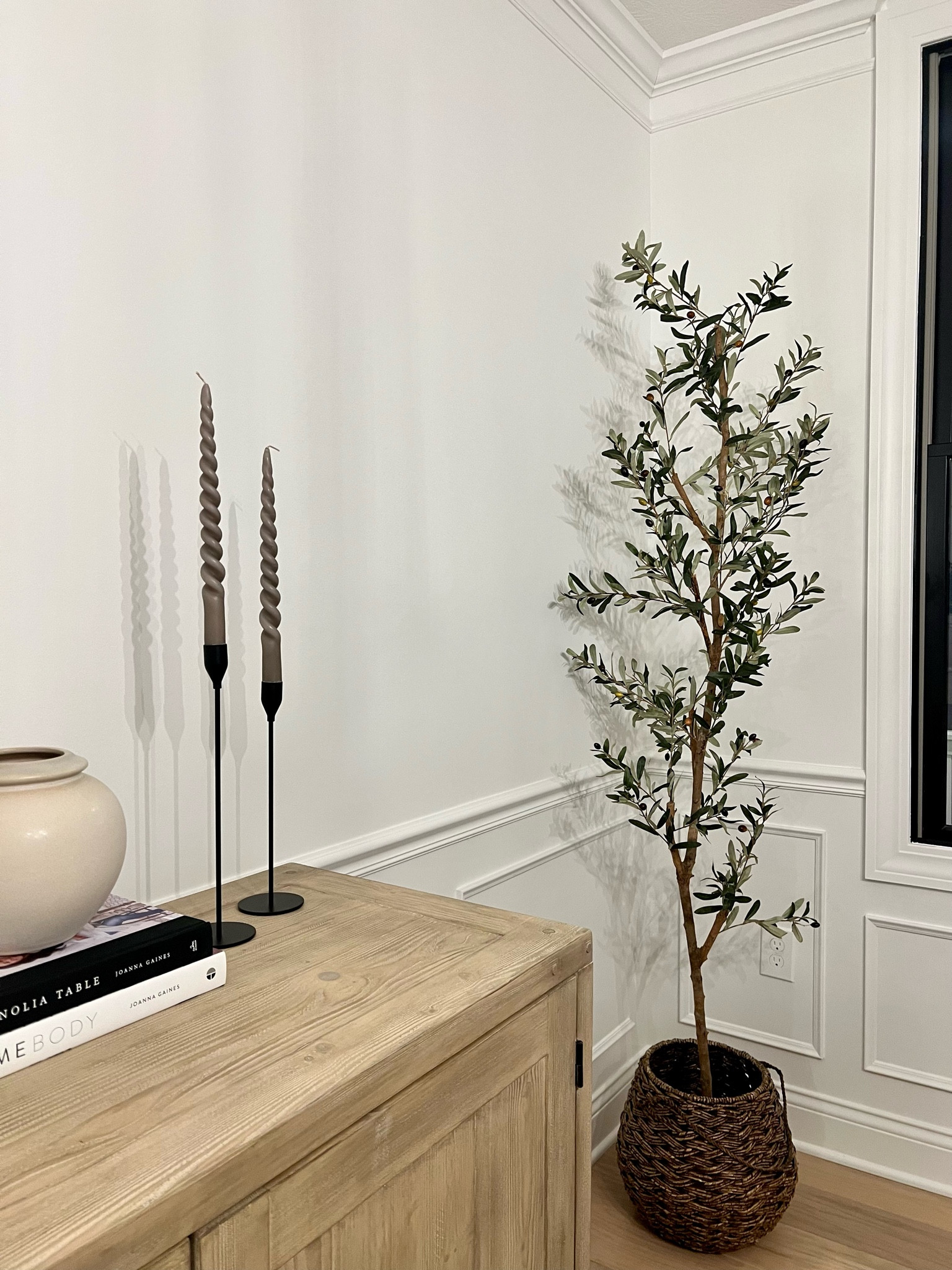 spiral candles, taupe candlesticks, faux olive tree, earthenware low vase, sideboard decor, buffet decor, modern farmhouse dining room 

#LTKhome #LTKunder50 #LTKFind