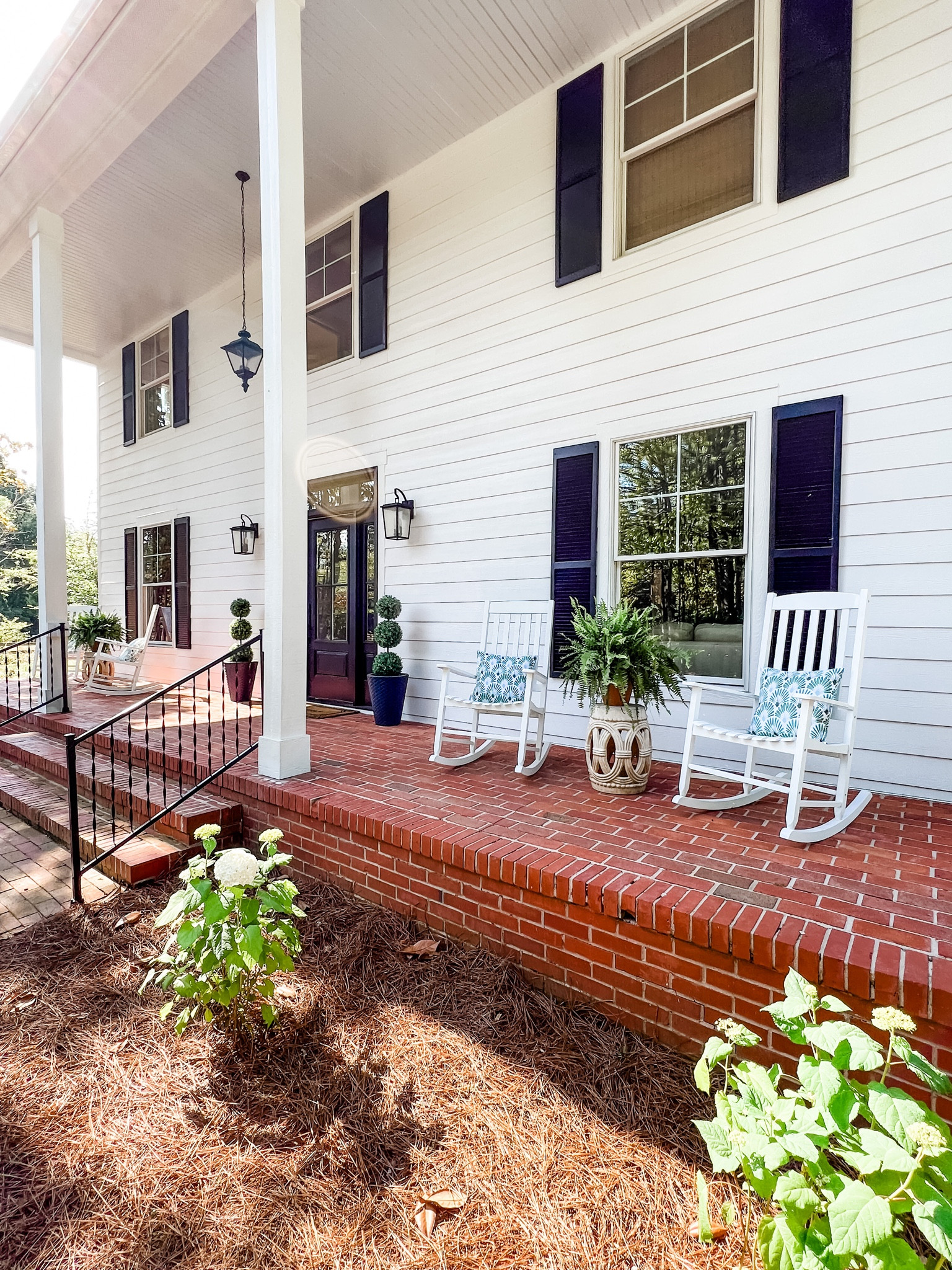Is there anything better than a front porch ready for rocking and reading?
.
.
.
.
.
#frontporch #outdoorstyle #rockingchairs #frontporchdecor #greenandwhitedecor #greenandwhitegarden #greenandwhitepillows #blueceiling #haintblue

#LTKunder50 #LTKSeasonal #LTKhome