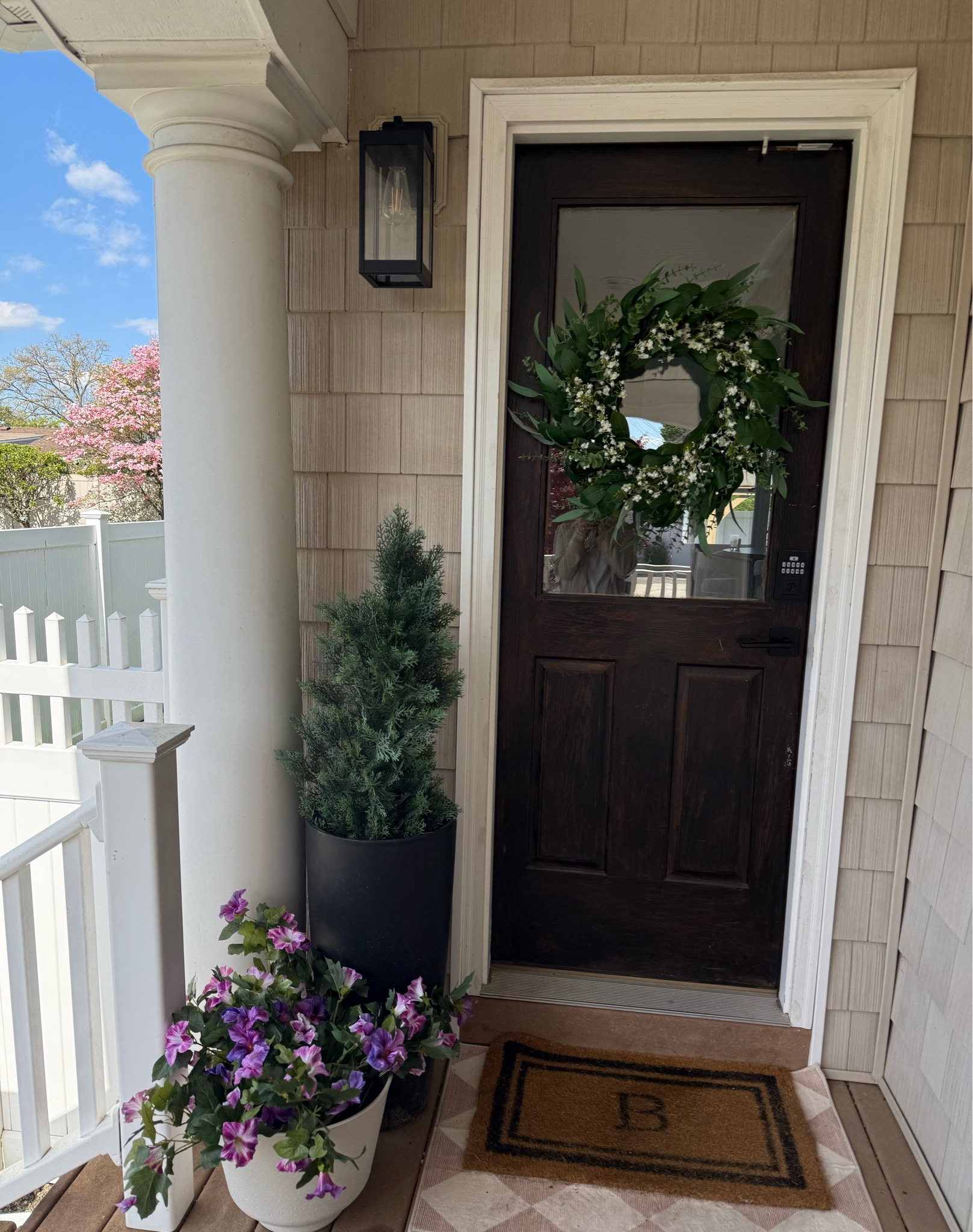 Side door spring porch - fake everything for me bc I can’t keep my flowers alive !! 

#LTKmomlife #LTKHome #LTKSeasonal