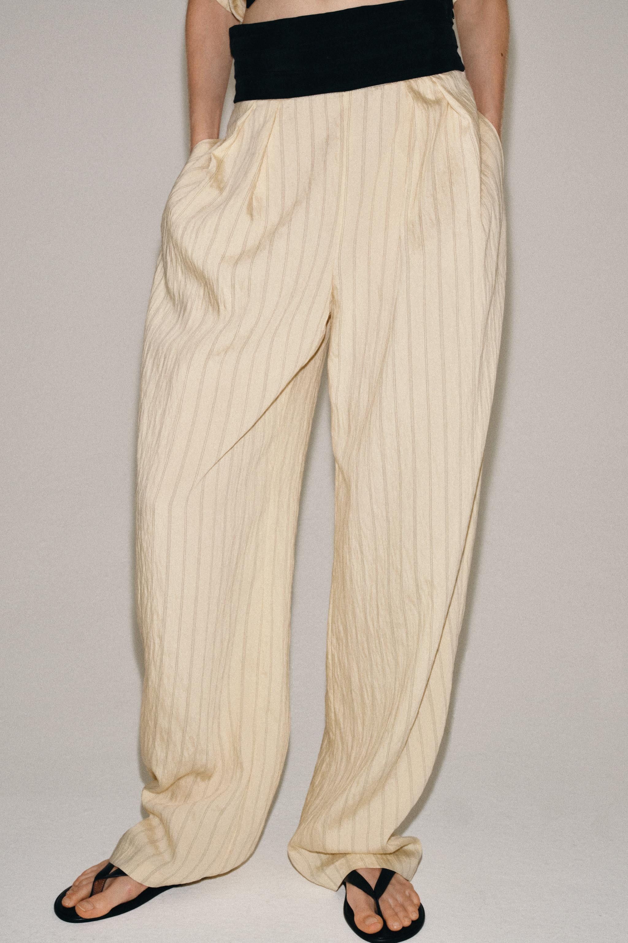 ZARA WOMAN COLLECTIONMid-rise trousers with a contrasting combination sash. Side pockets hidden i... | Zara US