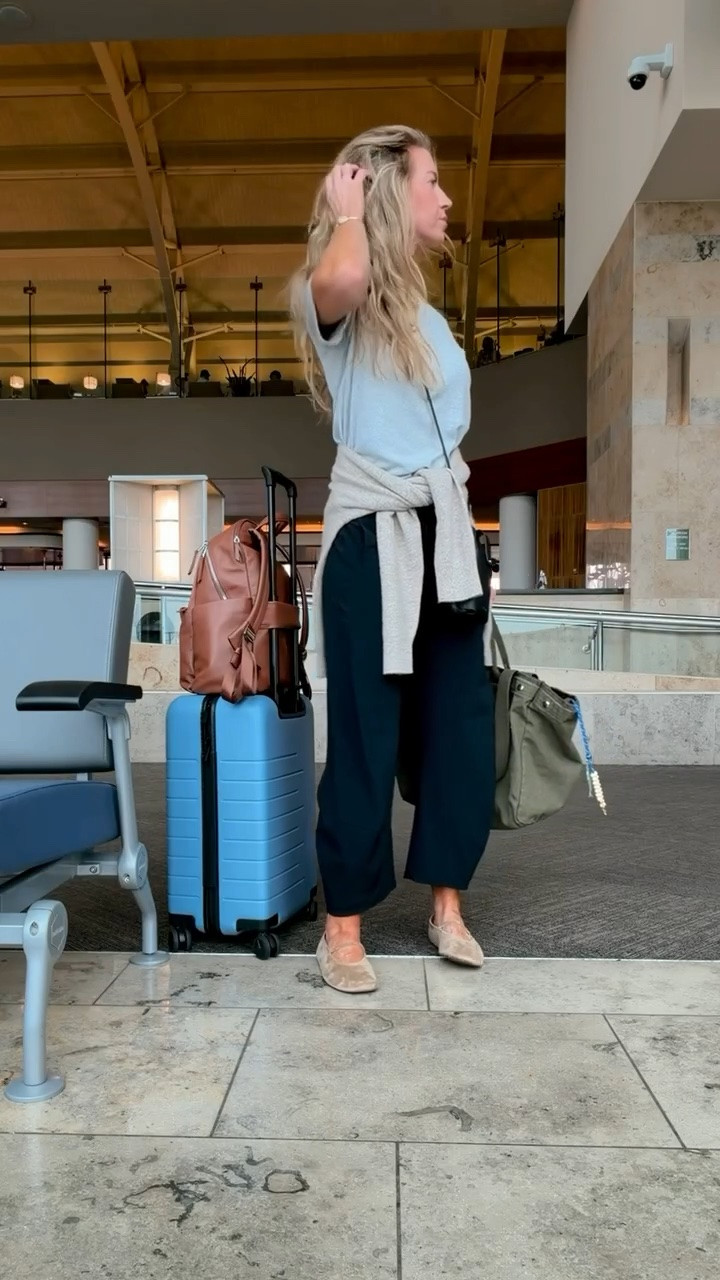 Comfy airport travel outfit from this weekend. 

Cashmere sweater: run slightly oversized, wearing a S
Black Ruti pants: unfortunately, they are as amazing as they look, run TTS, wearing a 2
Grey T-shirt: so soft and luxe, happy this is back in stock! Runs slightly oversized, wearing a S.

#LTKTravel #LTKootd #LTKmomlife