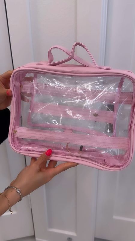 Clear cosmetic bag that fits so much and has different compartments for travel! Folds and hangs 

#LTKfindsunder50 #LTKfindsunder100 #LTKsalealert