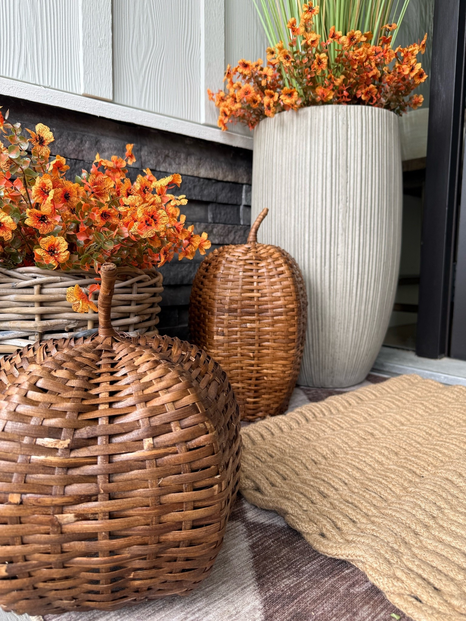 Dark rattan pumpkins..found these at Target! They are open at the bottom for adding a flameless candle…love them for the front porch. 
Fall home decor