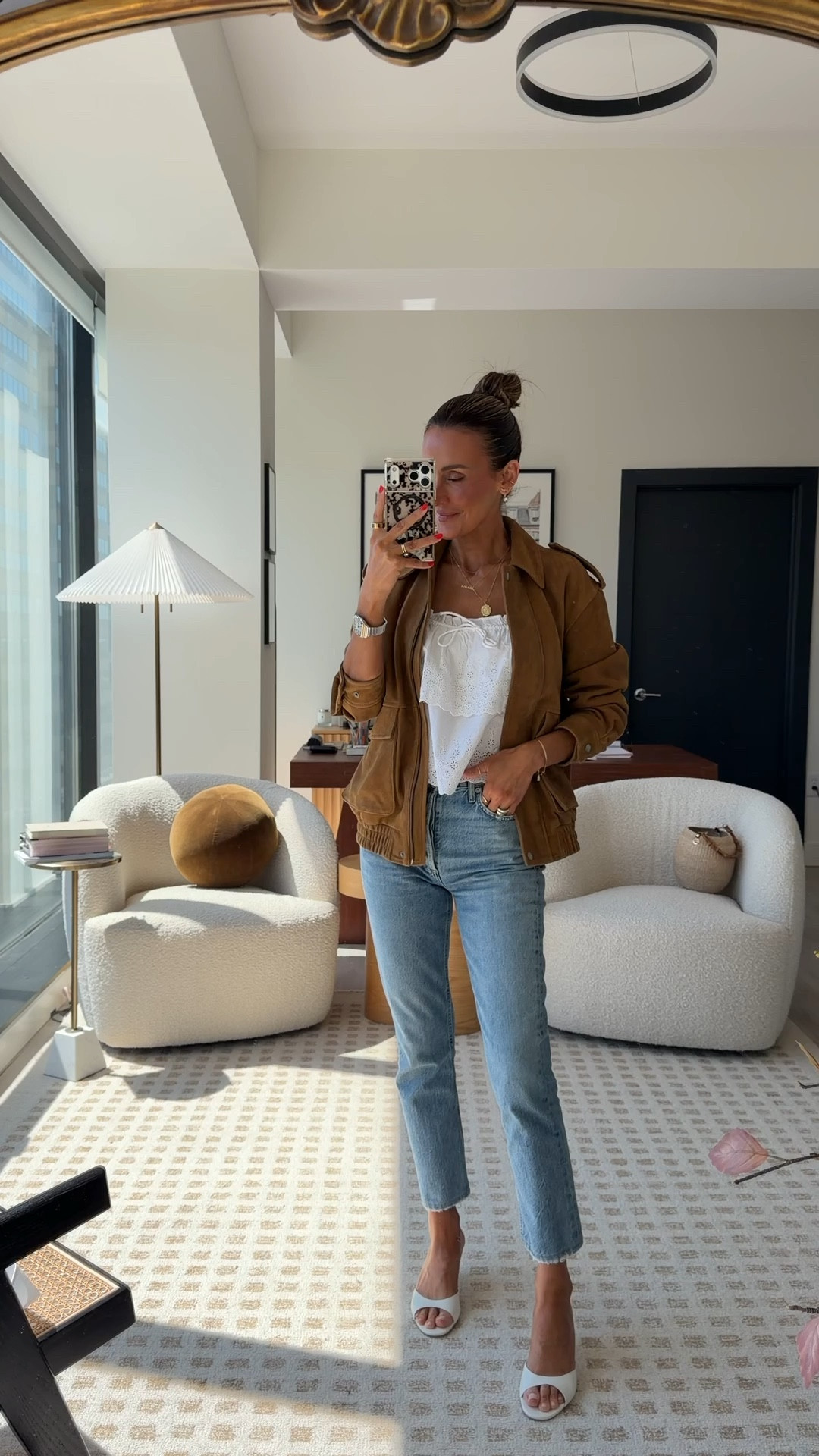 What I’m Wearing to the office on a chilly sunshine Monday! This eyelet tiered top instantly makes everything more summery! These jeans are the trendiest cut right now! High waisted and cigarette silhouette- suede jacket xs - perfect for transitioning weather. Top small 

#LTKootd #LTKMothersDay #LTKFestival