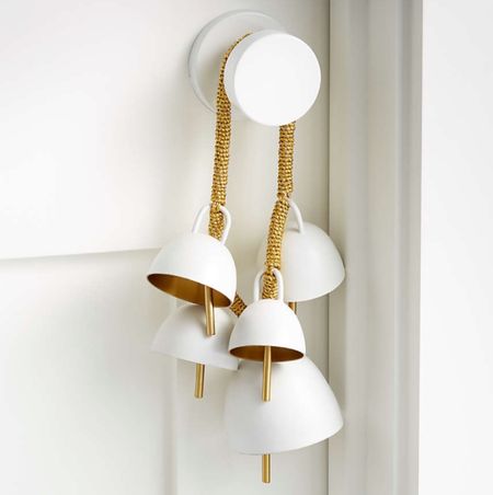 how cute are these hanging gold and white christmas bells!? christmas decor, holiday decor, christmas bells, crate and barrel christmas decor, new christmas decor, gold and white christmas decor

#LTKhome #LTKHoliday #LTKSeasonal