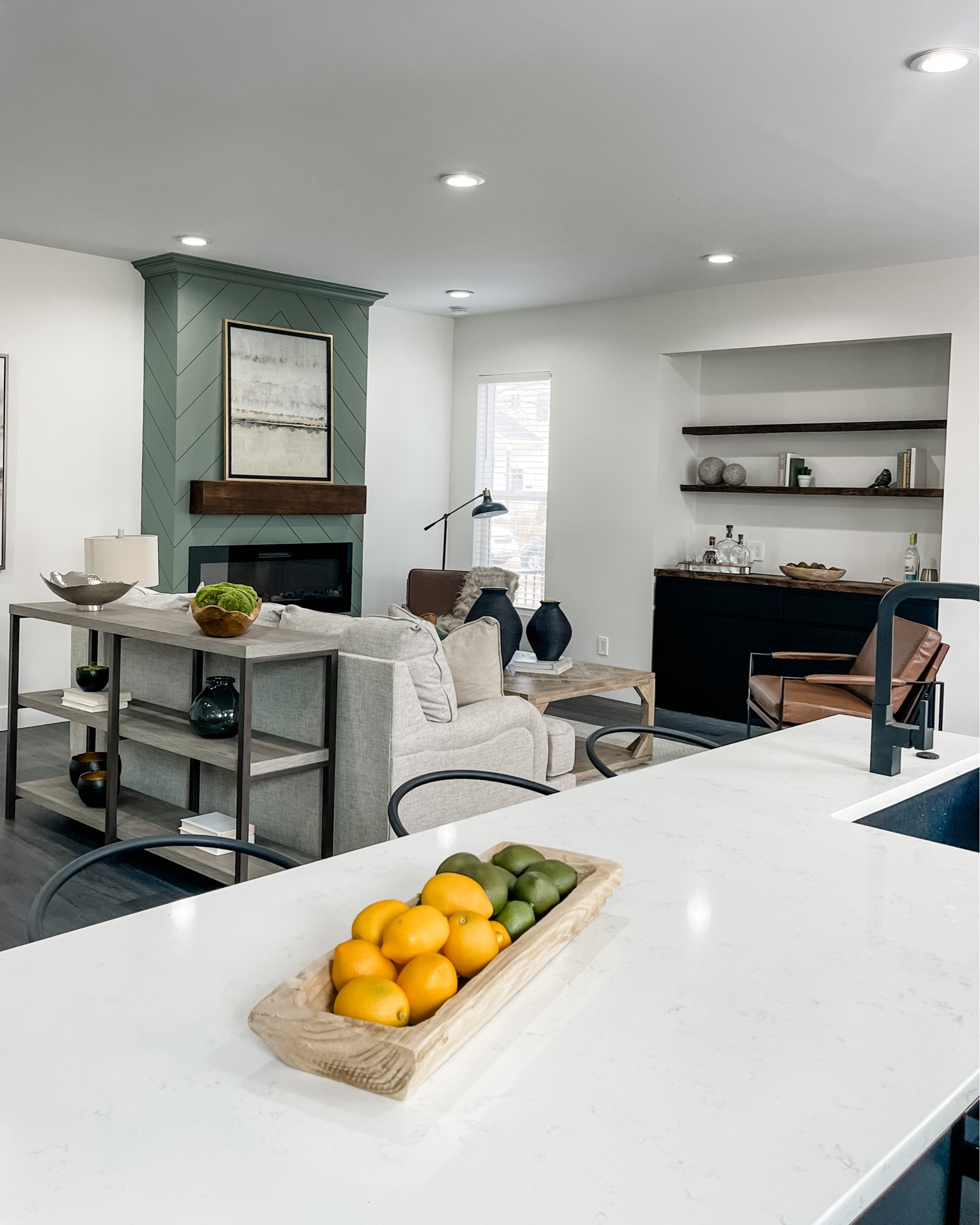 A view from a kitchen that you’ll always love! We loved styling the family room with wood tones, leathers, creams and blacks tones. 

#LTKhome #LTKfamily #LTKstyletip