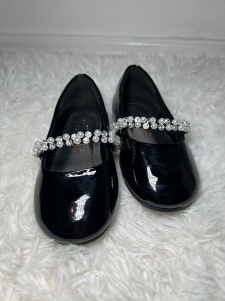 Adorable black ballerina flats with pearls and rhinestone details on the upper band of the shoes. #amazonfashion #founditonamazon

#LTKshoecrush #LTKkids