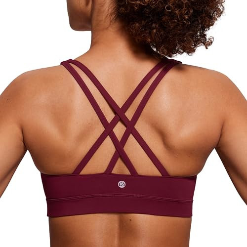 CRZ YOGA Women's Strappy Sports Bras Fitness Workout Padded Yoga Top Criss Cross Back Cami Red Merlot Large | Amazon (US)