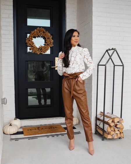 Fall outfit with brown faux leather paper bag pants paired with white lace long sleeve blouse. Love this look for workwear, teacher outfit and more! Link similar pants, a look for less pump and fall decor 

#LTKworkwear #LTKstyletip #LTKSeasonal