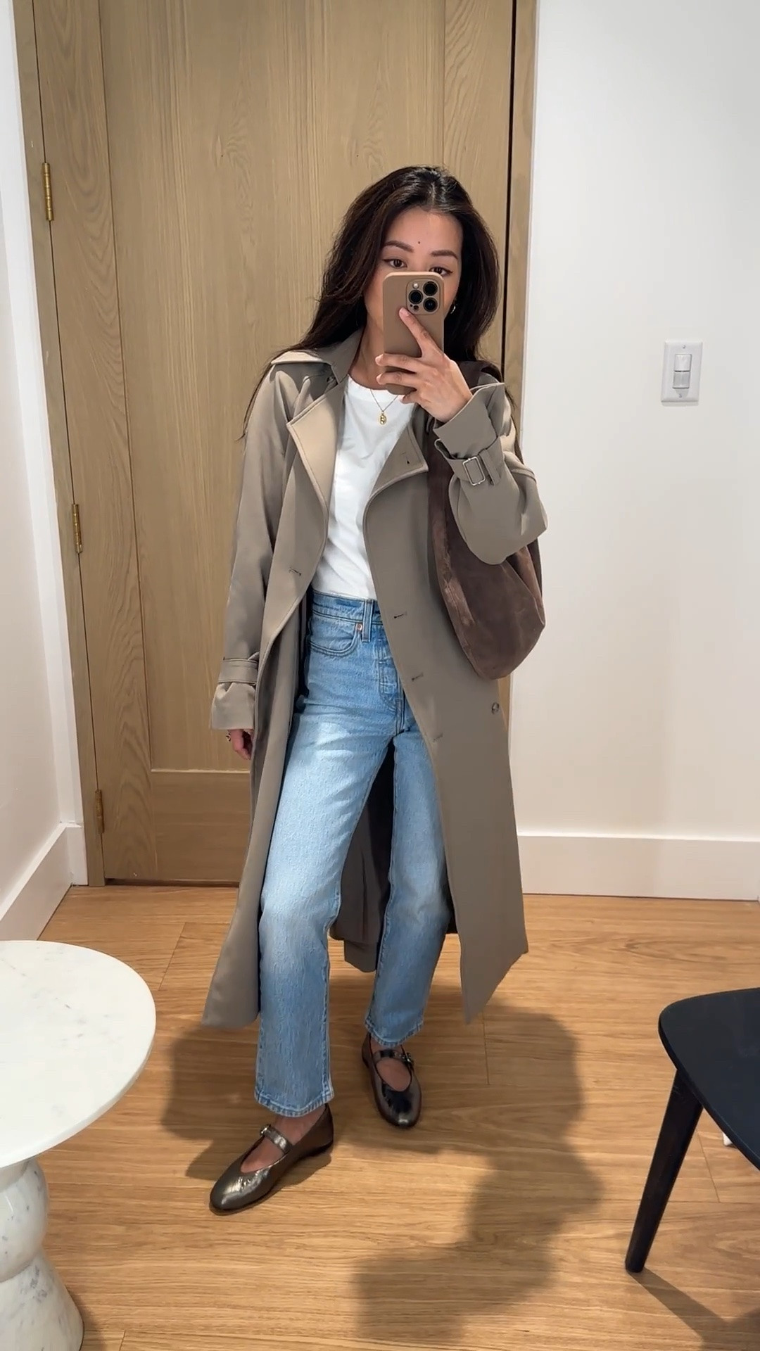 Use code JEANTRENCH for 15% off in the US only on this jacket. 
• Oak + Fort trench XXS in Brindle, this runs very big but I love it. It may take some getting used to for small framed petites but the drape is beautiful. I always wear with the belt cinched tight  in the back to give it shape. 

• Levi’s wedgie straight jeans size 25 waist 26 length in fully baked wash. I size up at the waist. Length is perfect. I own these jeans in multiple colors! 
• Madewell tee XS
• Madewell flats 5.5 - my exact color is sold out, but comes in many other colors 
 • Etsy suede hobo bag in Corteccia color, medium size. Perfect slouch, very comfy over the shoulder. 

Petite friendly, casual weekend outfit, good petite jeans

#LTKPetite #LTKootd #LTKmomlife