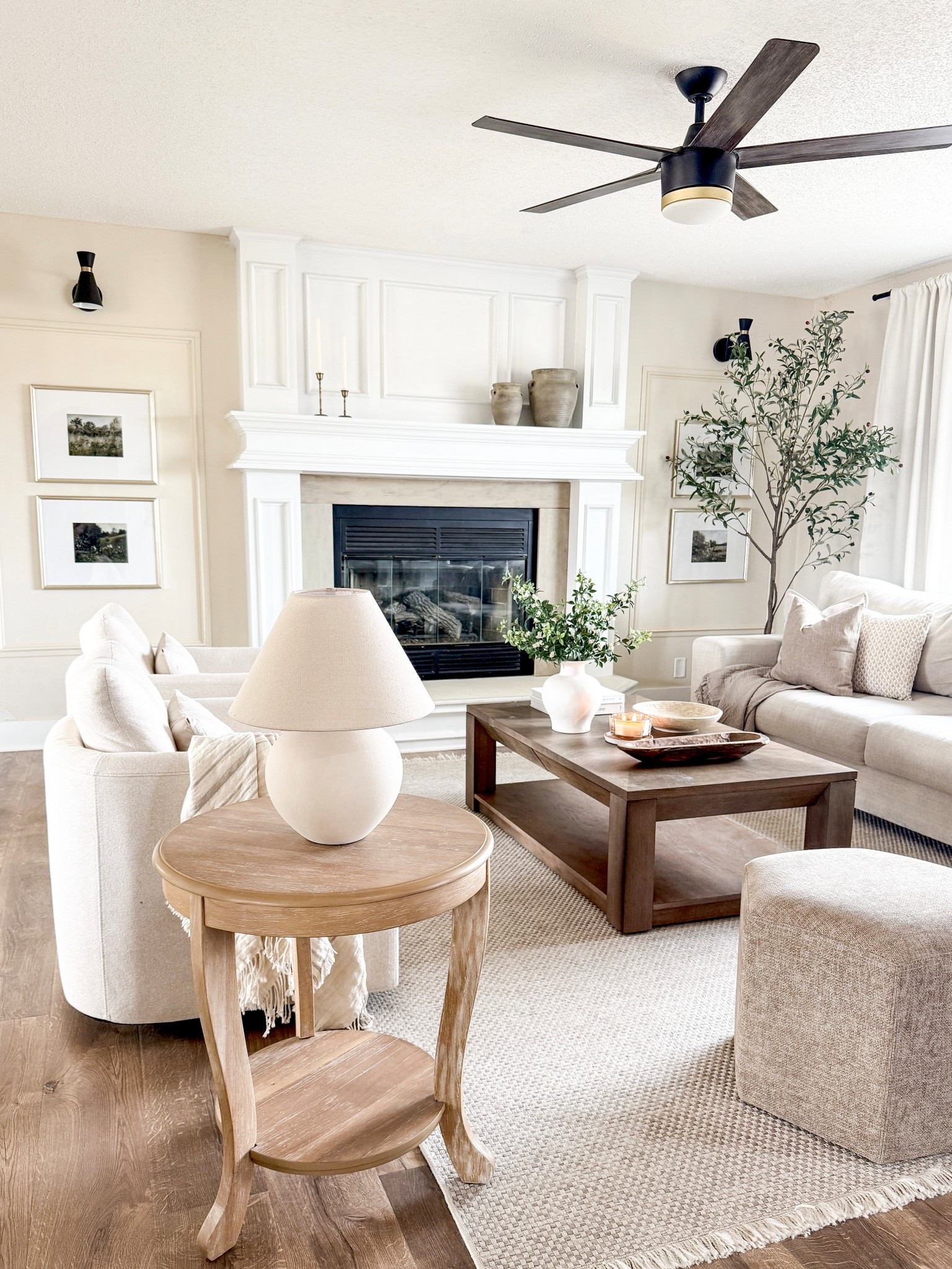 Living room inspo, sofa, couch, coffee table, end table, side table, accent chair, living room chair, swivel chair, ottoman, area rug, neutral rug, faux tree, faux greenery, wall frame, gallery wall, ceiling fan 

#LTKHome #LTKFindsUnder100 #LTKSaleAlert