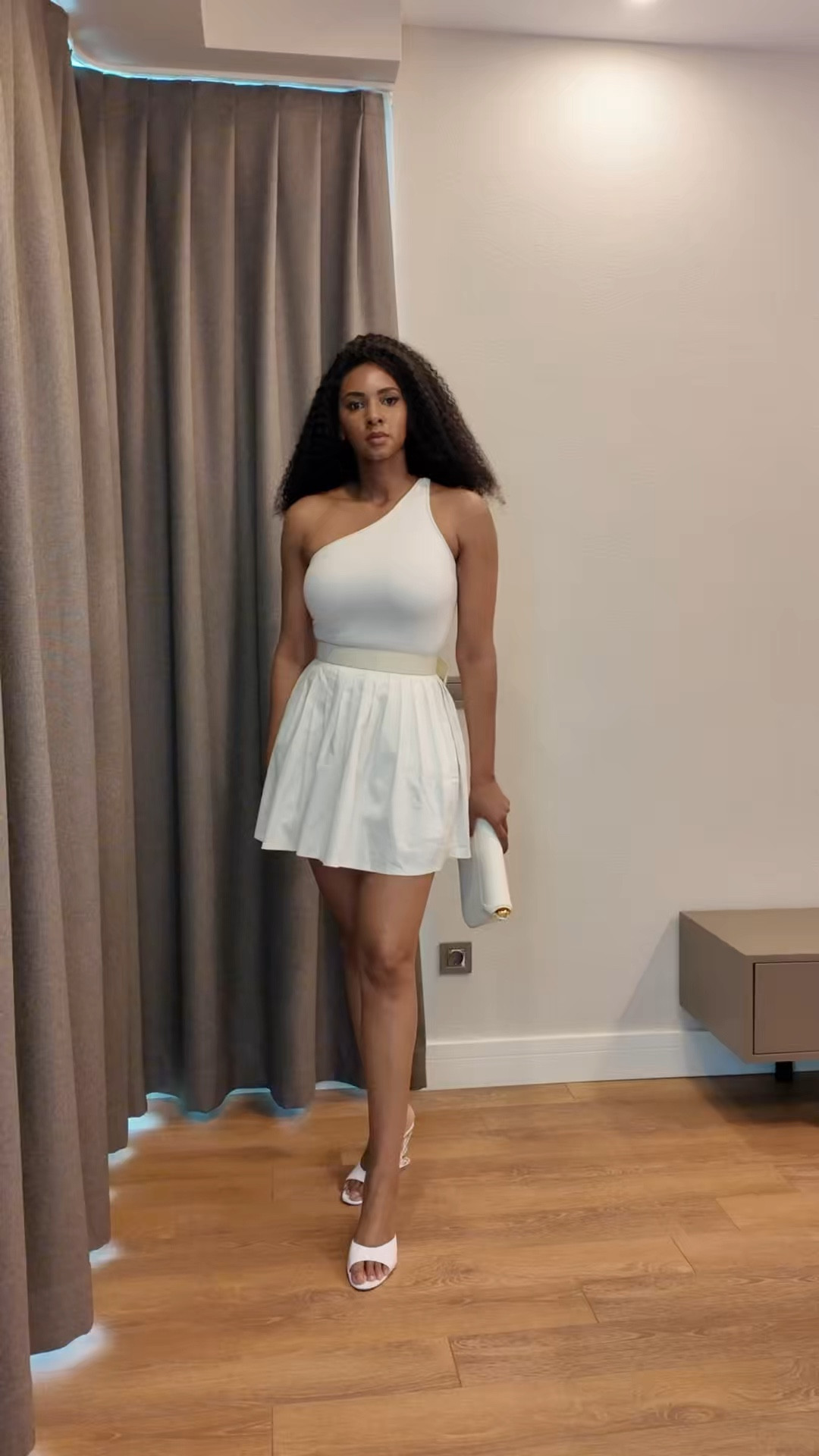 Pairing a white blazer with black leather shorts creates the ultimate contrast between polished and playful. Perfect for a night out or a bold daytime look. 

#LTKstyletip