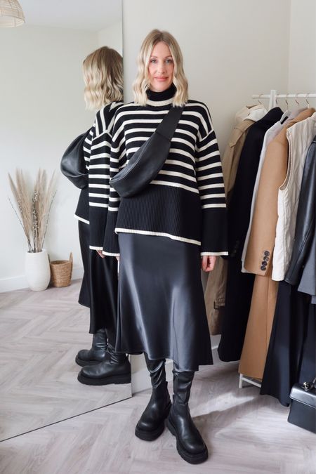 Toteme Striped sweater - striped jumper - stripe knit outfit styled with a black satin slip skirt and chunky boots #stripes #knitwear #toteme #farfetch

*get 10% off my Toteme jumper with my Farfetch discount until Oct 31st - CHARLOTTEFF

#LTKeurope #LTKSeasonal #LTKstyletip