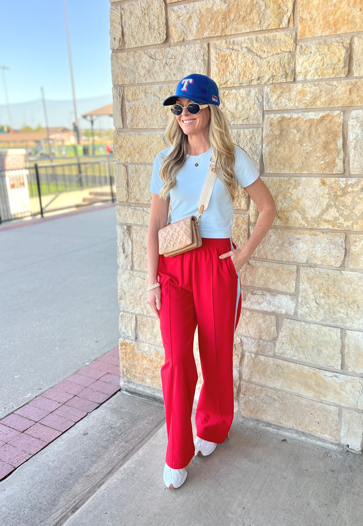 Last night’s baseball look ❤️💙⚾️
.
We had 1 day game and 1 evening game.
I absolutely love watching our boys play baseball! 😍
.
.
-track pants + top on sale now, $41 for both @targetstyle (pants are selling out fast)
-accessories + new balance sneakers
@nordstrom
- bag @louisvuitton I switched out the gold chain strap to the sporty strap.
.
Everything linked on my LTK
Search there @hollythehousewife and follow along 
.
.
.
.
.
#targetstyle #trackpants #activewear #sportylook #baseballmom #affordableoutfit #trackpant #ltkover40 #trackpanttrend #baseballstyle #momfit #momoutfit #gamedayoutfit #sportylooks #athleisure #elevatedathleisure #elevatedactivewear #mommystyle #momstyle #gamedaylook #casualoutfitideas #streetstyle #streetstyles 

#LTKActive #LTKStyleTip #LTKItBag