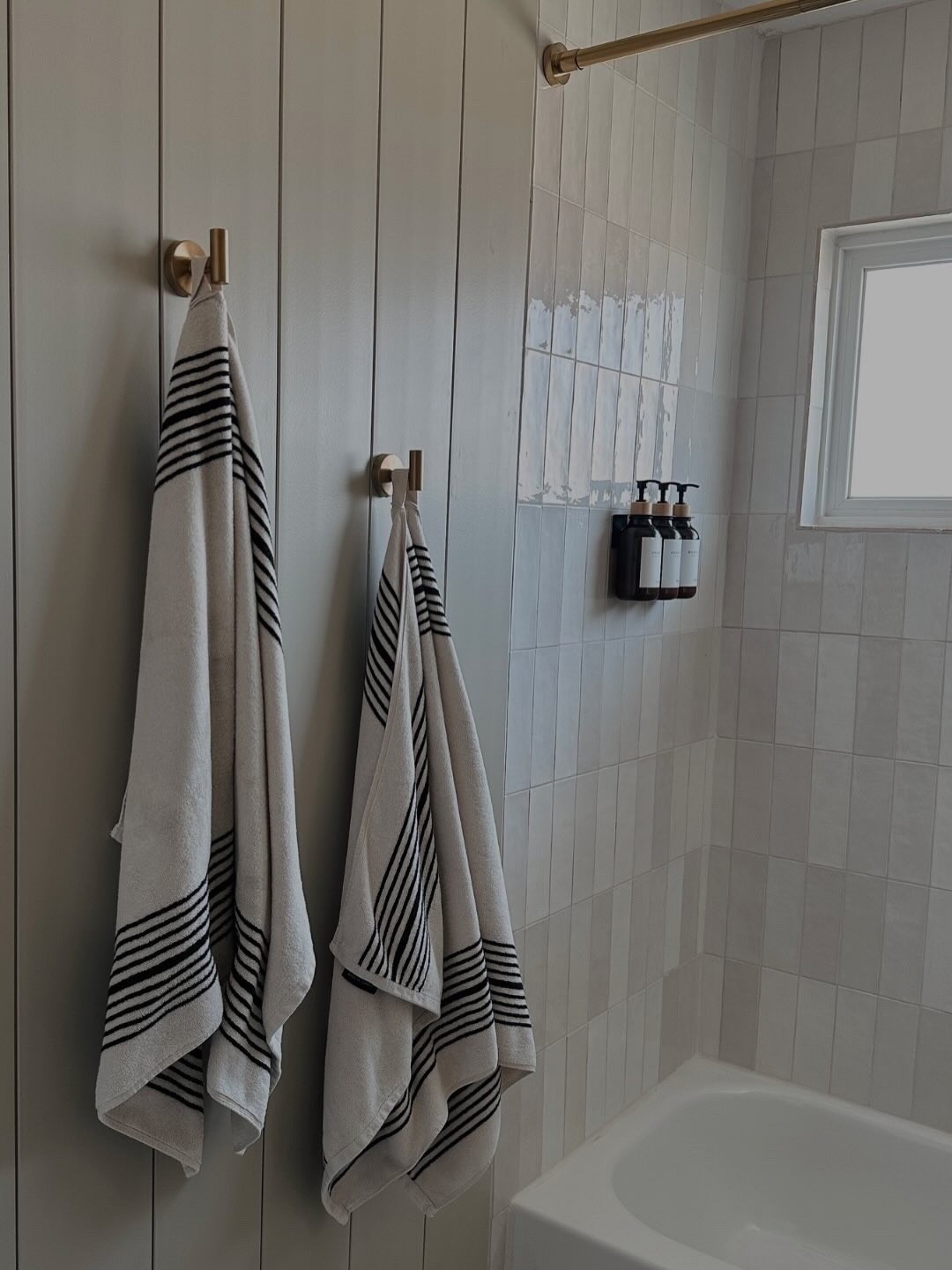 Guest bathroom views - these Loomia towels are 10/10 and wash so well! Also saw my Lowe’s tile is back in stock 😍

Zellige tile, soap bottles, shower, terry towels, bathroom decor 

#LTKHome