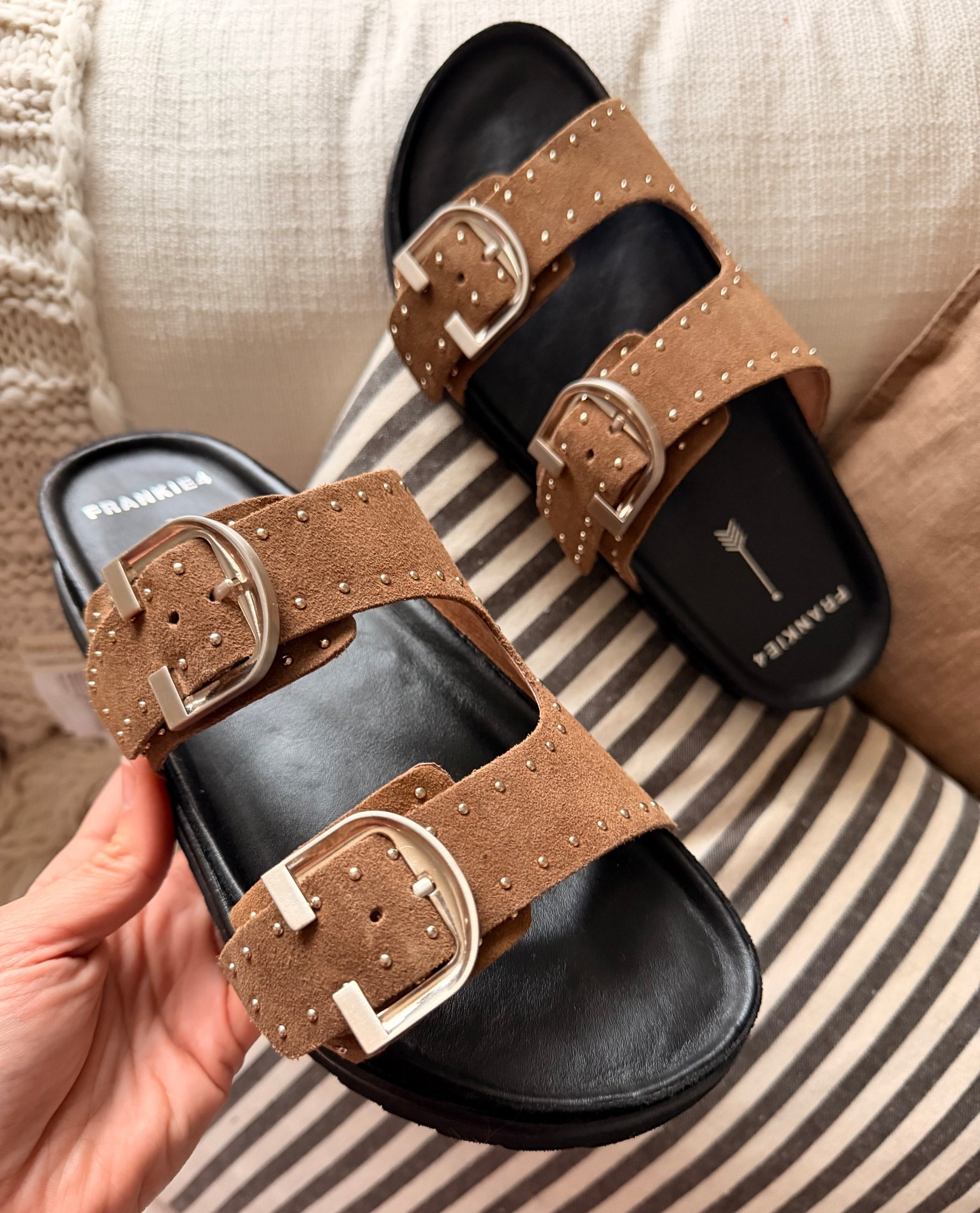 A comfy take on bold style 🤎 These suede stud slides give that Birkenstock-inspired look but elevated from Frankie4✨ Super soft suede, adjustable straps, and the comfiest cushioned footbed. They’re supportive, chic, and perfect for everyday wear.

#LTKStyle #LTKShoeCrush #SuedeSandals #StuddedSandals #BirkenstockInspired #ComfortStyle #EverydayChic #MomStyle #NeutralStyle #EffortlessLook