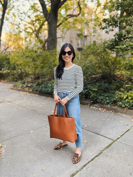 Casual outfit, mom outfit, weekend outfit, neutral outfit: black and white striped long sleeve (XS), striped t-shirt, high waisted mom jeans, brown tote bag, black sunglasses, leopard mule loafers (TTS).

#LTKSeasonal #LTKstyletip #LTKunder50