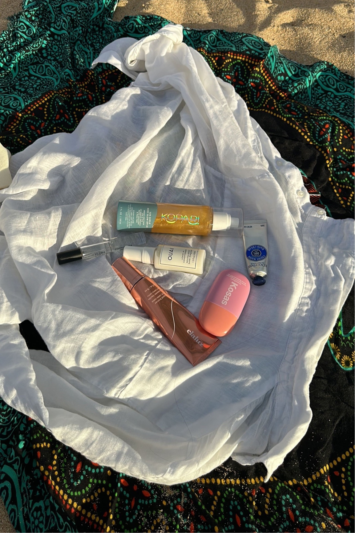 Essentials for a beach day 🤩

#LTKFind #LTKswim #LTKbeauty