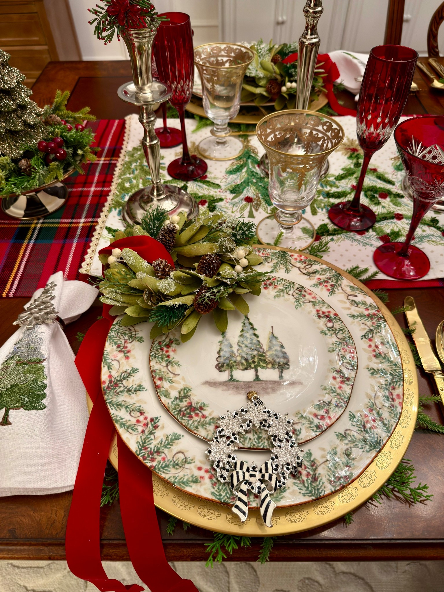 A traditional table set for the holiday season. 

#LTKSeasonal #LTKHome #LTKHoliday