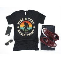 Hide & Seek World Champ Bigfoot Shirt/Gifts Sasquatch Yeti Lover Gift Design Tank Top Hoodie | Etsy (US)