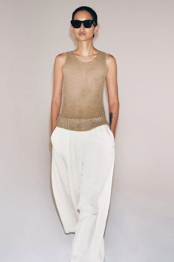 ZARA WOMAN COLLECTIONPants made of lyocell blend. Mid-rise with elastic waistband adjustable with... | Zara US