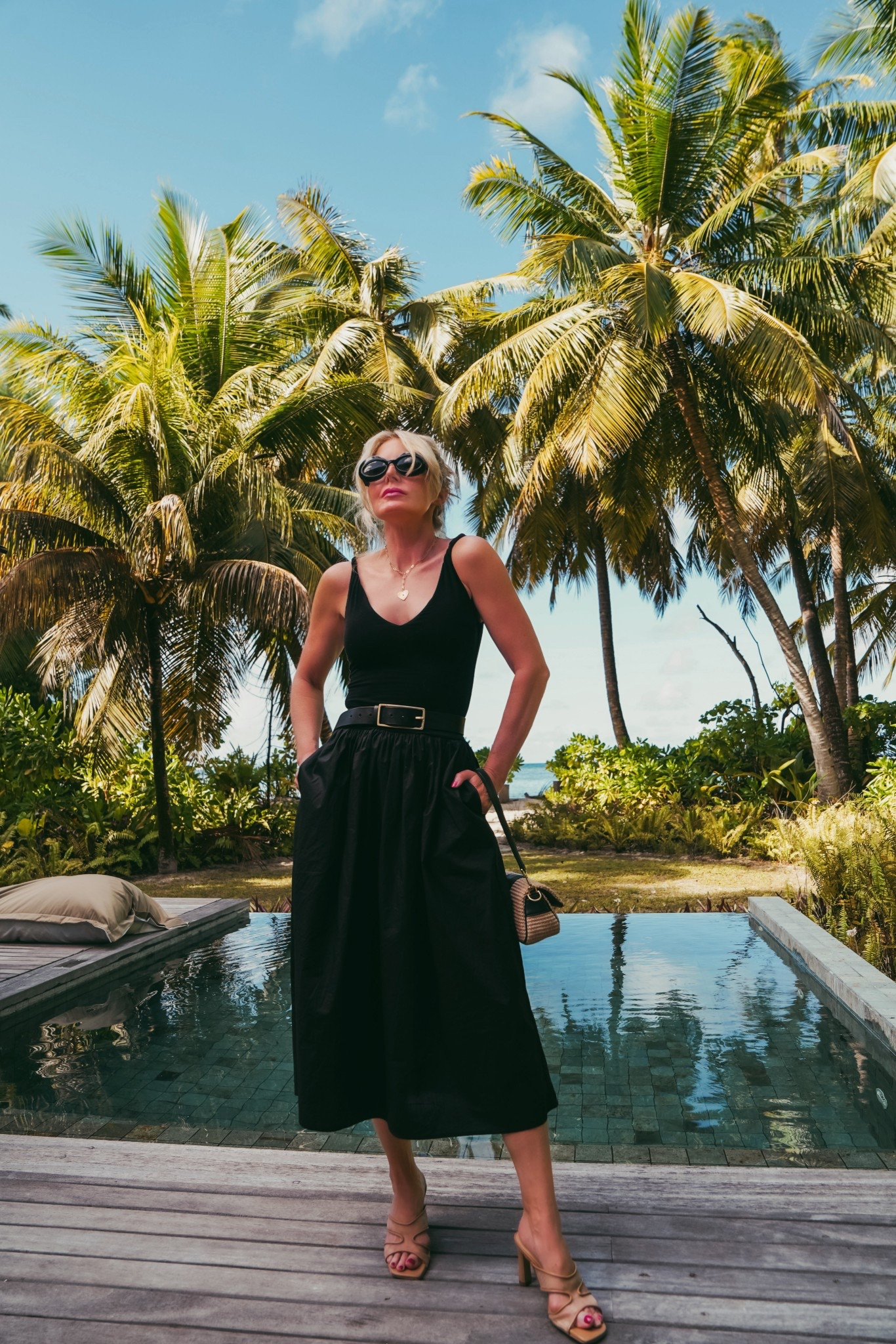 Your search for the perfect little black dress ends HERE. This ultra chic LBD is going to be your new go-to for effortless style–day or night–spring through summer (and beyond!). It's lightweight and breathable (perfect for those warmer days), super flattering (the fit is *chef's kiss*), and it’s simple enough to dress down, yet structured enough to dress up. Not to mention, the cost per wear is AMAZING. It’s a go-to piece that looks good, feels good, and works hard in your closet.

Fits true to size.