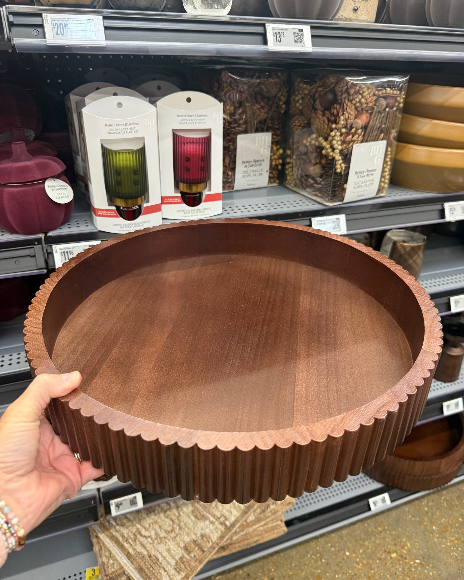 Fall hosting just got a whole lot easier 🍂🧀 all under $25!

I found the prettiest hosting pieces at Walmart, all from Better Homes & Gardens, and they're the kind of thing that makes a simple spread look like you spent hours on it.

🍁 **Fluted wood tray**: the scalloped edge and rich, warm brown finish are so good. Use it for a coffee table centerpiece, a drink station, or a big grazing tray.

🍁 **2-tier acacia wood stand**: the gold arched frame makes it feel so elevated. Perfect for desserts, cookies, or apple cider donuts. It's about 13" tall, so it adds height to any table.

🍁 **Marble platter with wood stand**: charcuterie board, meet your new best friend. The natural marble and wood legs are gorgeous and will look great long after fall ends.

Stack, layer, and mix heights, and your table will look styled without even trying. 😍

#LTKhome #LTKfall #LTKparties #LTKfindsunder50 #LTKSeasonal #falldecor #hostingessentials #charcuterieboard #walmarthome #betterhomesandgardens

#LTKHome #LTKOver40