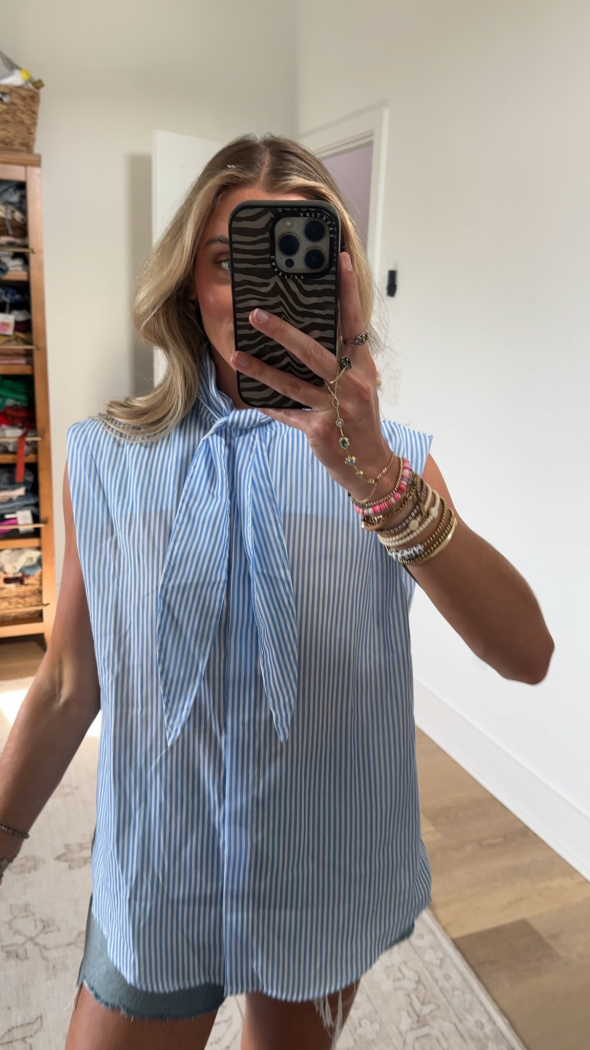 Amazon size small Chevara Women’s Laced Striped Shirt Sleeveless Tie Neck Lightweight Summer Blouse Button Down Office Work Top

#LTKootd #LTKWorkwear #LTKSaleAlert