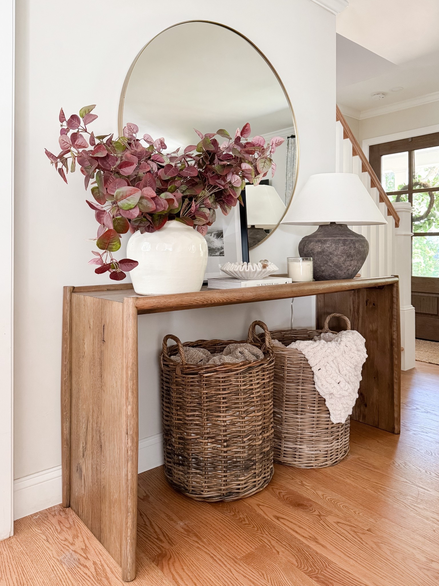 Coastal Fall Entryway

Wooden console table, woven basket, knit throw blanket, basil candle, book stack, marble bowl, terracotta vases, faux stems, beaded garland, Sherri calnan home

#LTKFindsUnder50 #LTKHome #LTKSeasonal