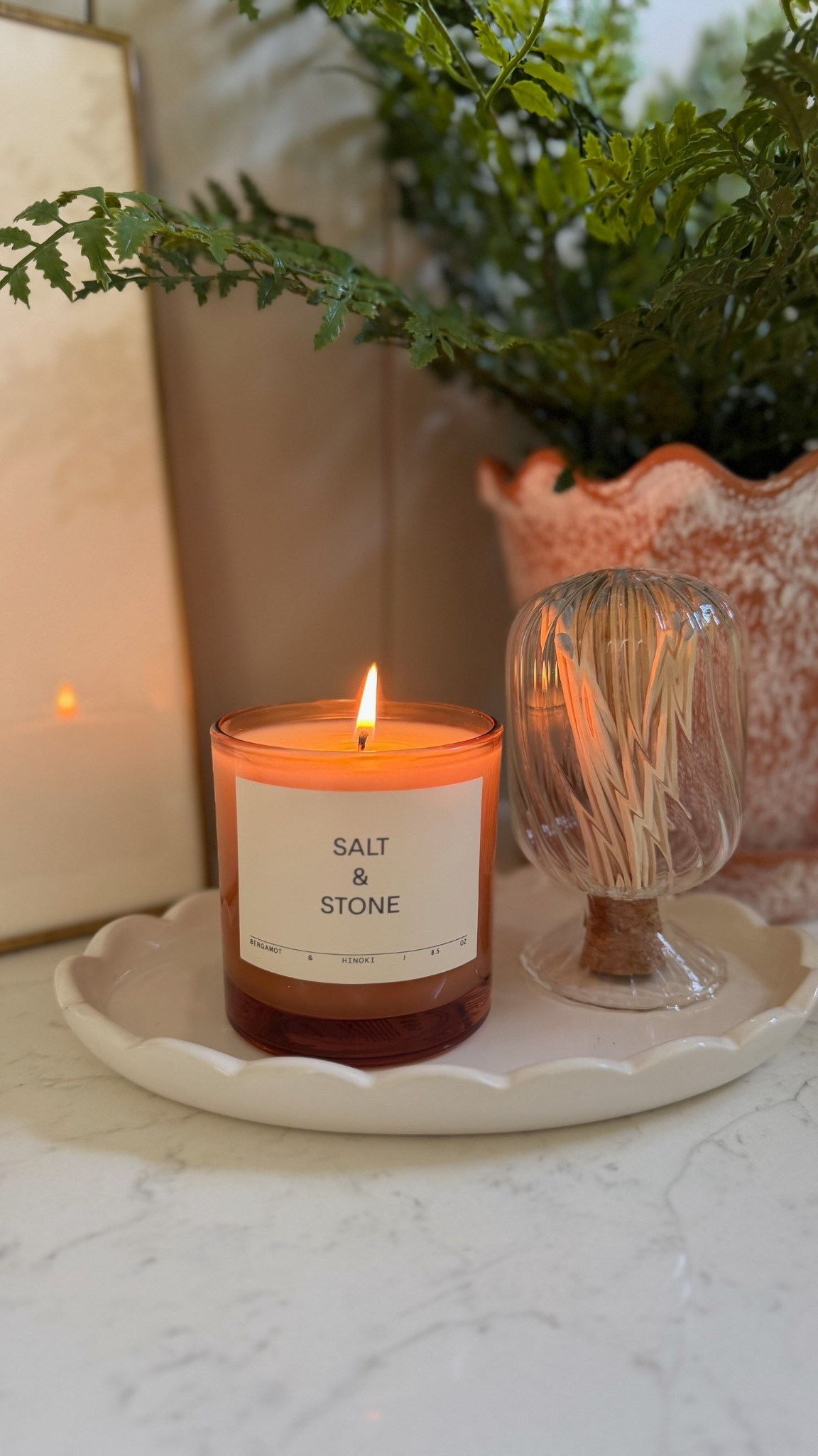 I added the cutest little moment to our bathroom for a touch of charm! I love this Salt & Stone candle for a touch of color and the warm scent. I paired it with this Walmart planter and Target tray for an affordable look.

#LTKHome