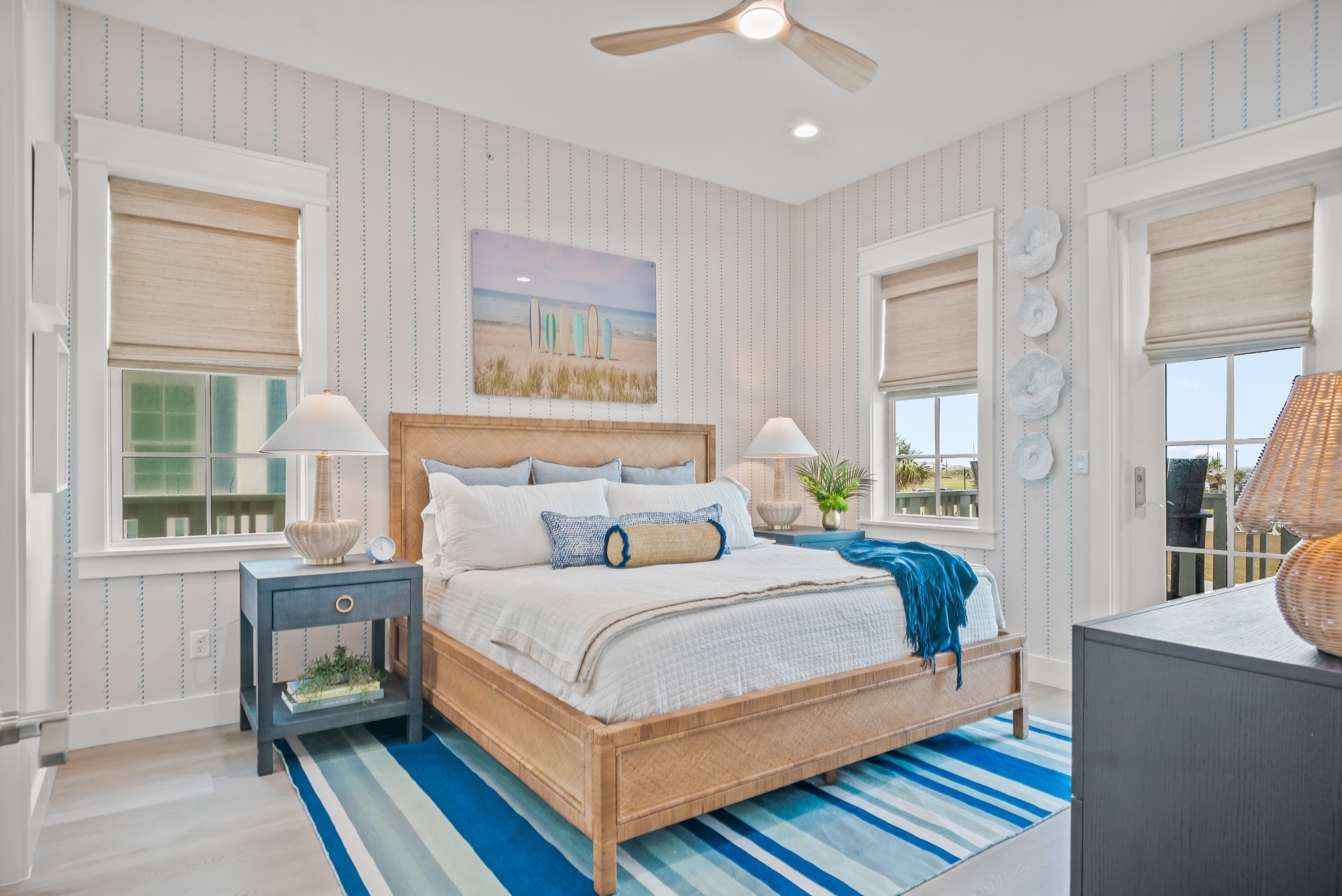 A surf shack, but make it look designer. 🏄‍♂️✨ The Surfboards, Nantucket by Gray Malin sets the tone, Premier Prints fabric adds the chill, Pinstripe Umbrellas wallpaper from Wayfair brings the charm—and yes, even the side tables are Wayfair finds. Coastal, collected, and effortlessly cool. 🌊 

#LTKSeasonal #LTKHome #LTKSummerEdit