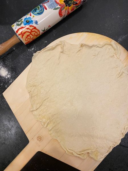 Pizza transfer board. Be sure to use corn meal so it slides off 🙌🏼

#LTKhome #LTKfamily