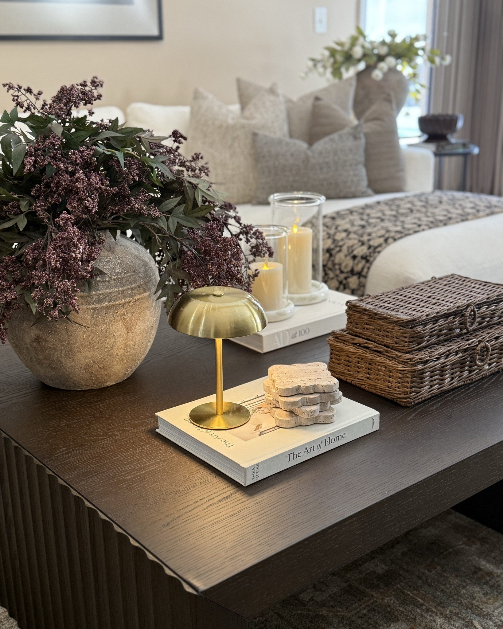 Neutral Coffee Table Styling with Decorative Accents

Follow @farmtotablecreations on Instagram for more home styling and decor finds.

A coffee table is one of my favorite places to layer simple decor pieces that make a living room feel finished. Stacking a few books creates the perfect base for styling smaller accents like a lamp or decorative coasters, while woven boxes add texture and hidden storage. I also love adding a vase with greenery and a few candles to bring warmth and softness to the space.

#coffeetabledecor #livingroomdecor #decorativebooks #vasedecor #candledecor #wovenbasket #neutraldecor #livingroomfurniture

#LTKHome #LTKSaleAlert