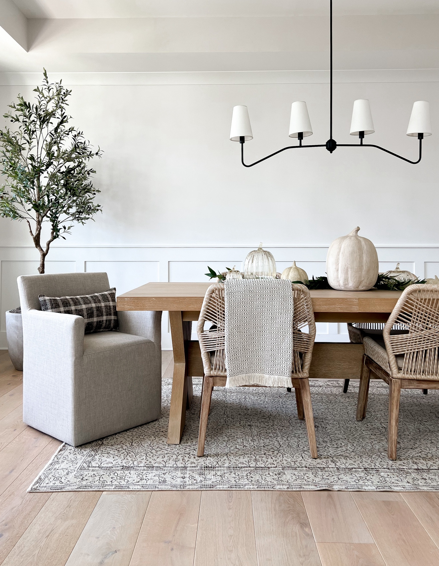 Neutral fall decor, faux pumpkins, terracotta pumpkins, glass pumpkins, fall home, fall styling, dining room, white oak dining table, upholstered dining chair, vintage rug 

#LTKFindsUnder50 #LTKHome #LTKSeasonal