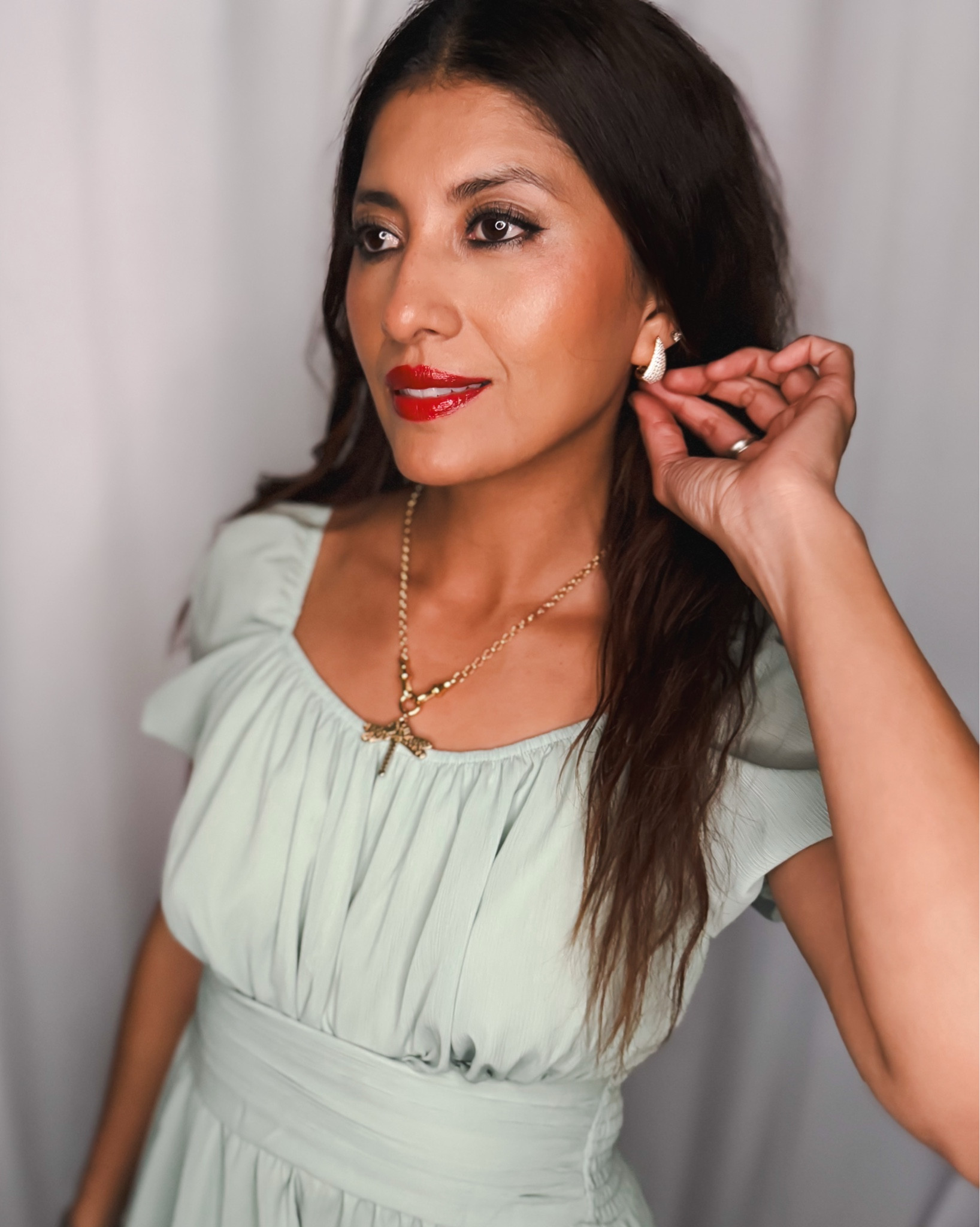 Ahava jewels from No Saints Jewelry Collection ✨ The Alchemy necklace + Rendezvous earrings are the perfect gold statement set to elevate any dress. I styled them with a soft sage green dress and bold red lip for a timeless glam look. Perfect for weddings, date nights, events, and holiday parties.

gold statement necklace
gold drop earrings
luxury gold jewelry set
statement jewelry for dress
elegant event accessories
modern glam jewelry
date night jewelry ideas
bridal guest jewelry
timeless gold layering pieces

#LTKWedding #LTKSpringSale #LTKSaleAlert
