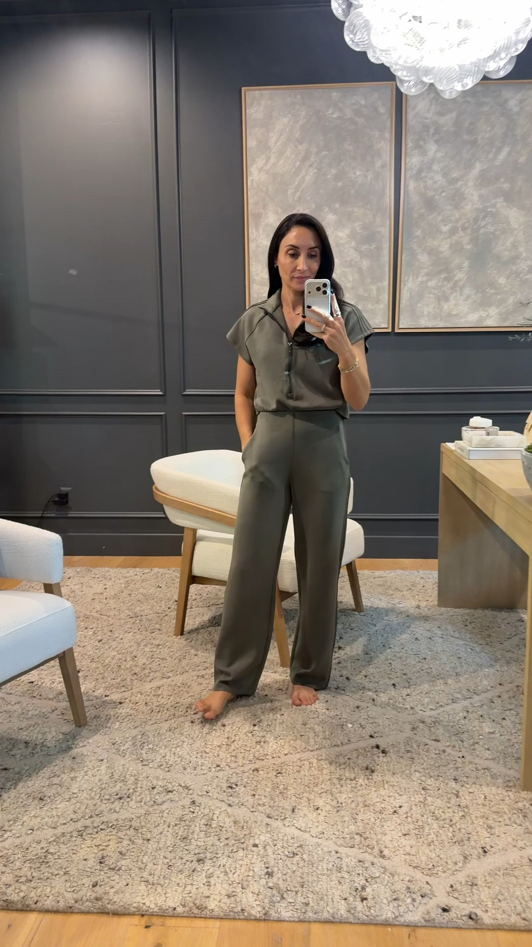 The most comfortable romper!  It feels like athleisure but way more put together. Comes in a variety of sizes and three different colors. This is herb 

I am always cold, but it’s still over 100° outside so this is the perfect go to. (This is a petite extra small)￼ I am 5’4” for reference ￼

￼ SPANX AirEssentials Pintuck Half Zip Jumpsuit, women’s petite jumpsuit, herb green jumpsuit, soft travel outfit, comfortable one-piece outfit, casual fall outfit, petite XS jumpsuit, women’s athleisure, everyday jumpsuit, flattering women’s jumpsuit, airport outfit, cozy loungewear, elevated casual style, fall fashion finds, SPANX jumpsuit outfit ideas

#LTKdayinmylife #LTKPetite #LTKSeasonal