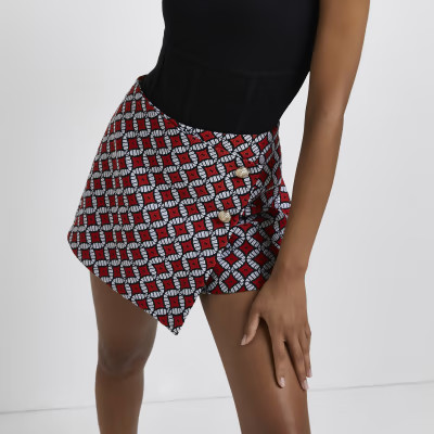 Red geometric print asymmetric wrap skort | River Island (UK & IE)