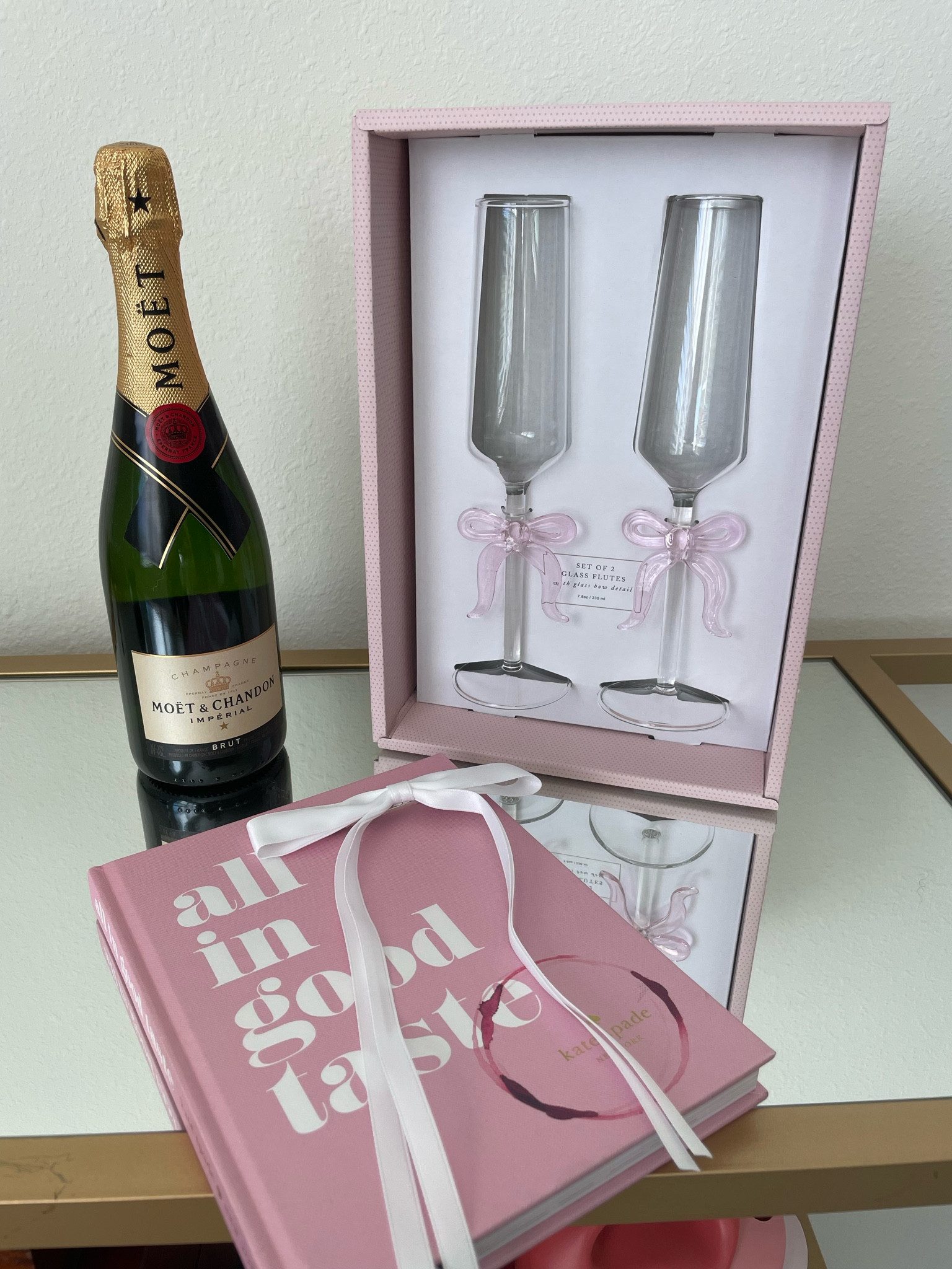 Trending feminine home decor. Bow ribbon champagne glasses and flutes. 

#LTKHome