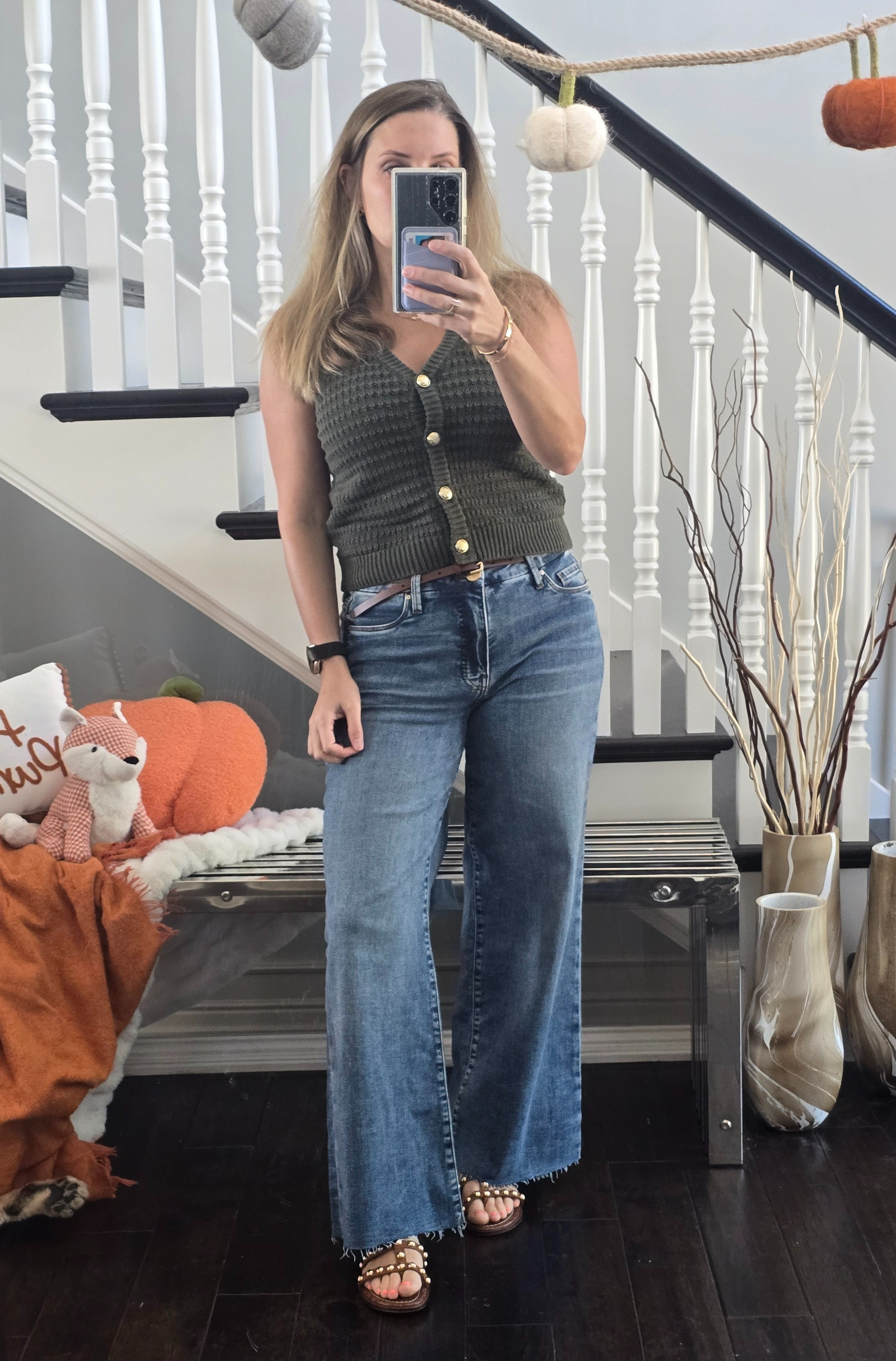 Early Fall Fashion*wide leg jeans*sweater vest*gladiator sandals*thin brown belt

#LTKSeasonal #LTKFindsUnder50 #LTKStyleTip