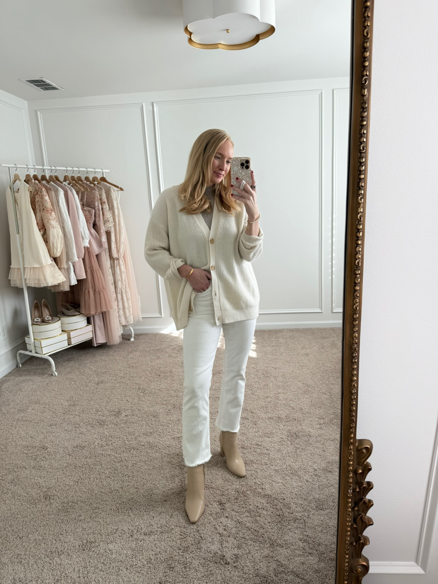 Cute but comfortable winter look! I paired this Quince cardigan with my white Mother jeans. Wearing size small in the cardigan and size 28 in the jeans. Winter outfits // monochromatic outfits // white jeans // cardigans // work outfits // workwear

#LTKStyleTip #LTKWorkwear #LTKSeasonal