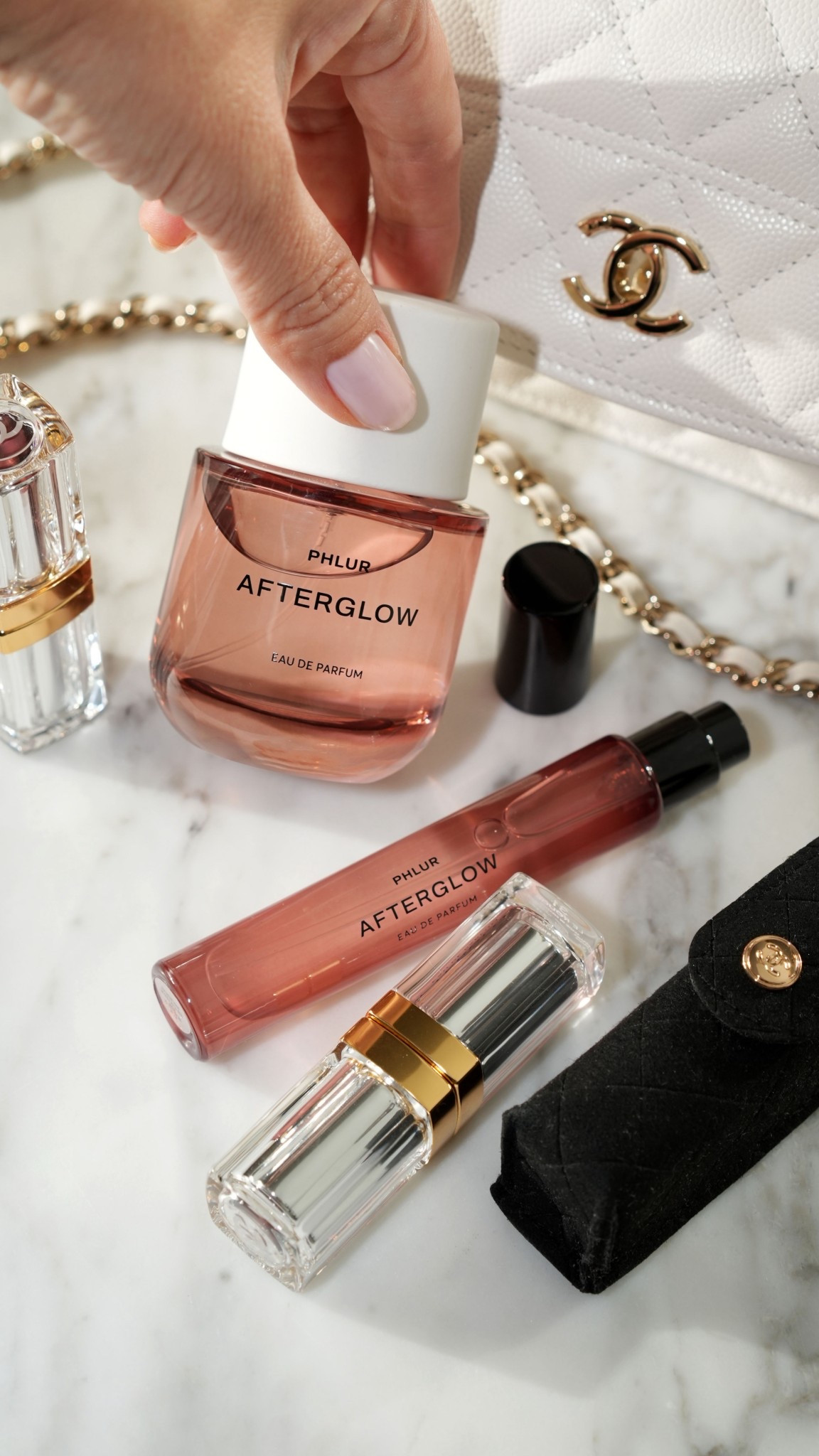 Phlur afterglow perfume, notes include ambrette, sandalwood, lavender milk with hints of coconut and apricot.

#LTKBeauty