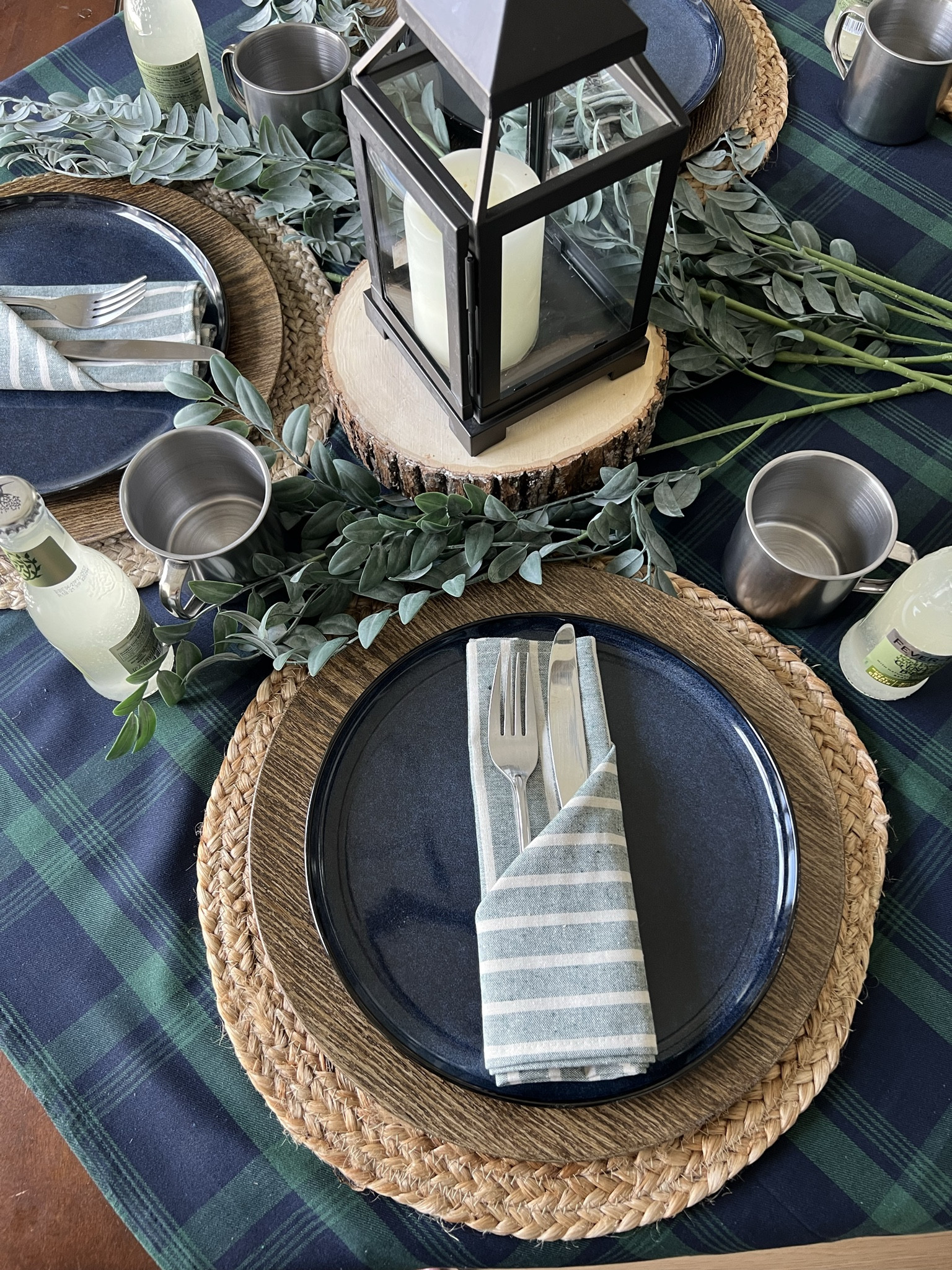 Place setting for my husband's mountain-themed birthday table! Loving the deep blue stoneware plates, subtle-stripe napkins, and tin mugs.  

 #LTKfoodie #LTKHome #LTKMens