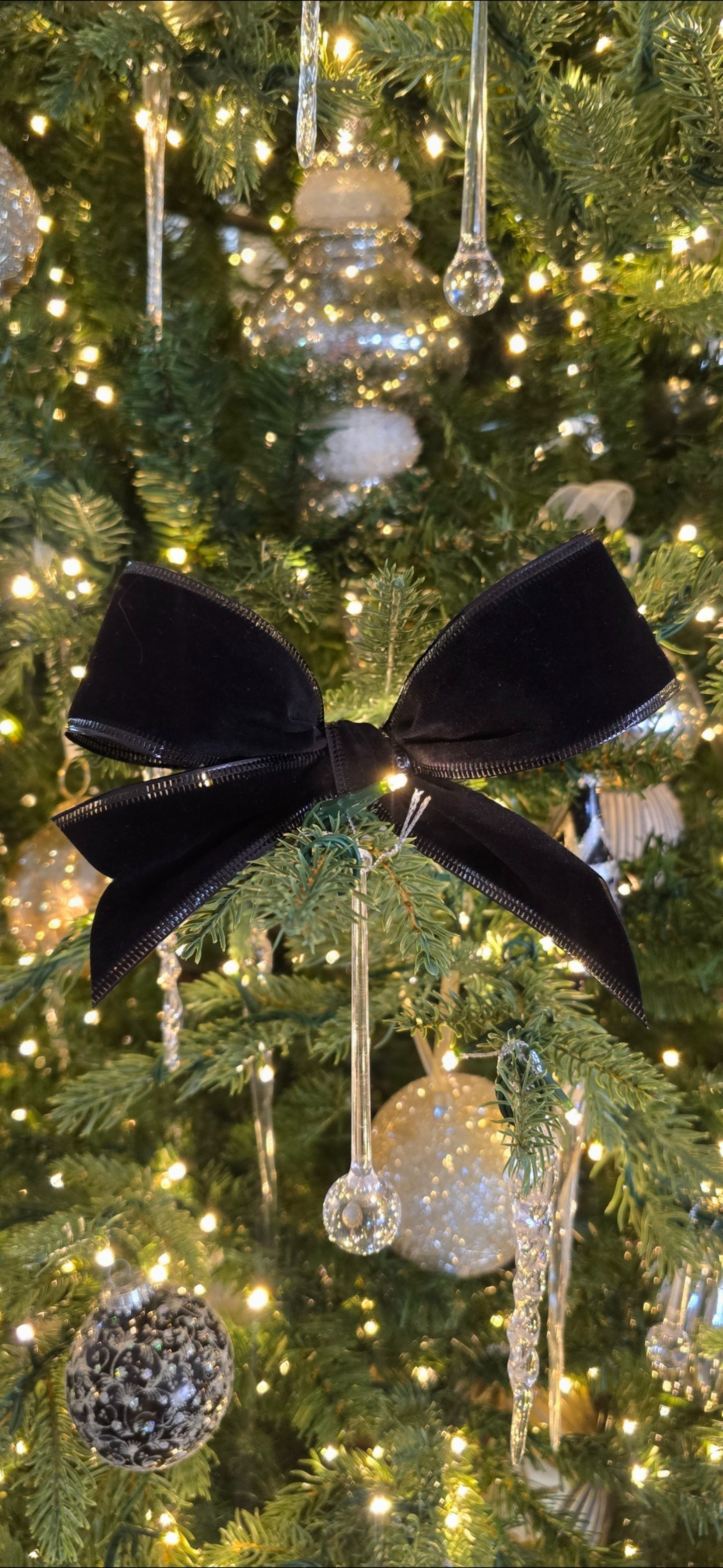 Shop this ribbon 🎀 This ribbon makes bow-making simple. It keeps its structure and looks rich on greenery, garlands, and trees.#HolidayDecor #ChristmasTreeDecor #VelvetRibbon #BlackVelvetBow #HolidayStyling #LTKHoliday #LTKHome #LTKSeasonal #ChristmasDIY #HolidayInspo #ChristmasTreeIdeas #WalmartFinds #AffordableHolidayDecor

#LTKHoliday #LTKSeasonal #LTKHome