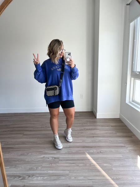 Linked same style sweatshirt from aerie this one isn’t on their site anymore. 
I’m wearing a L 
Romper is from aritzia also can’t link here but linking some of my fav bike shorts instead. 