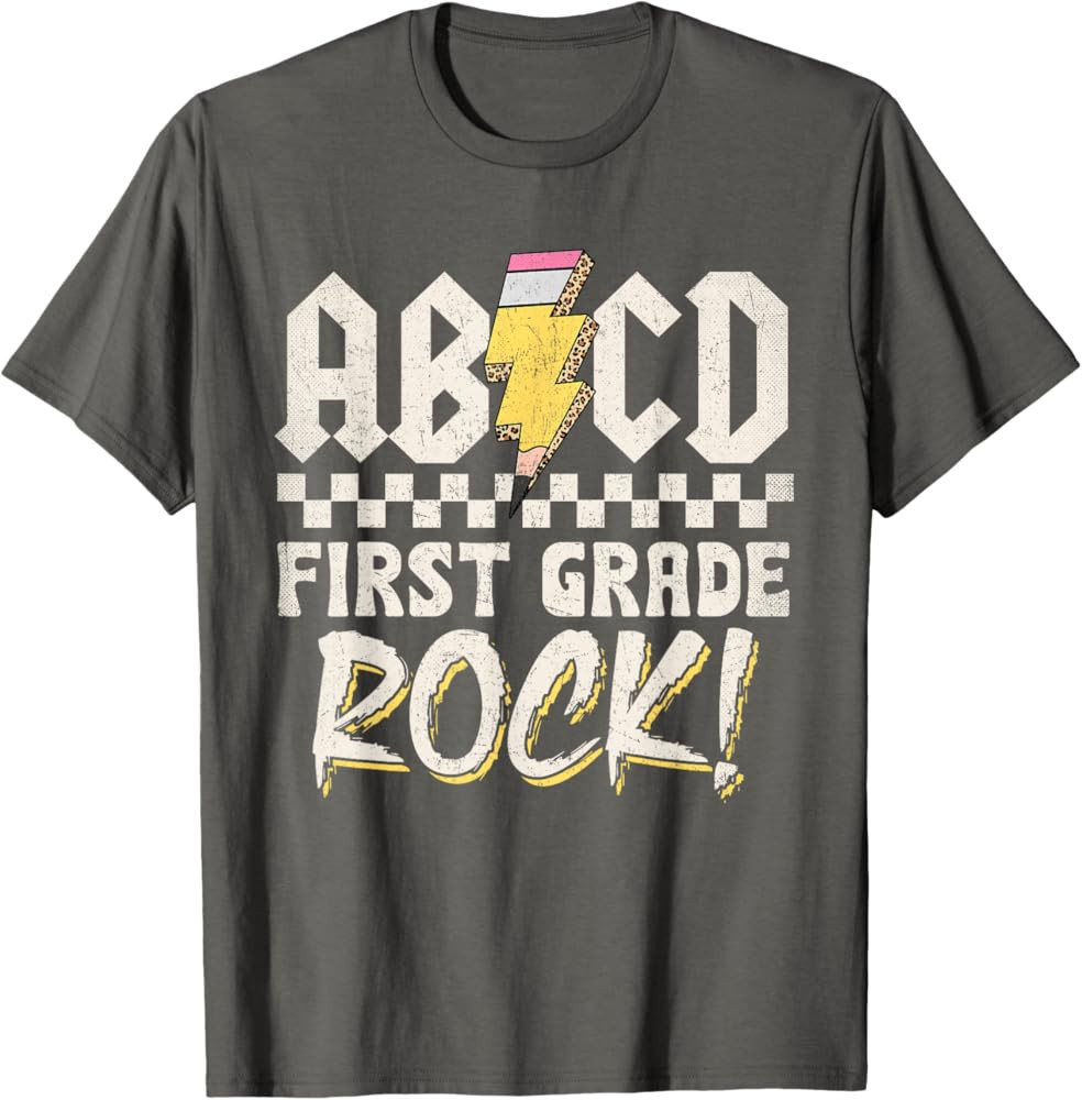 ABCD First Grade Rocks Back To School 1st Grade Teacher Kids T-Shirt | Amazon (US)