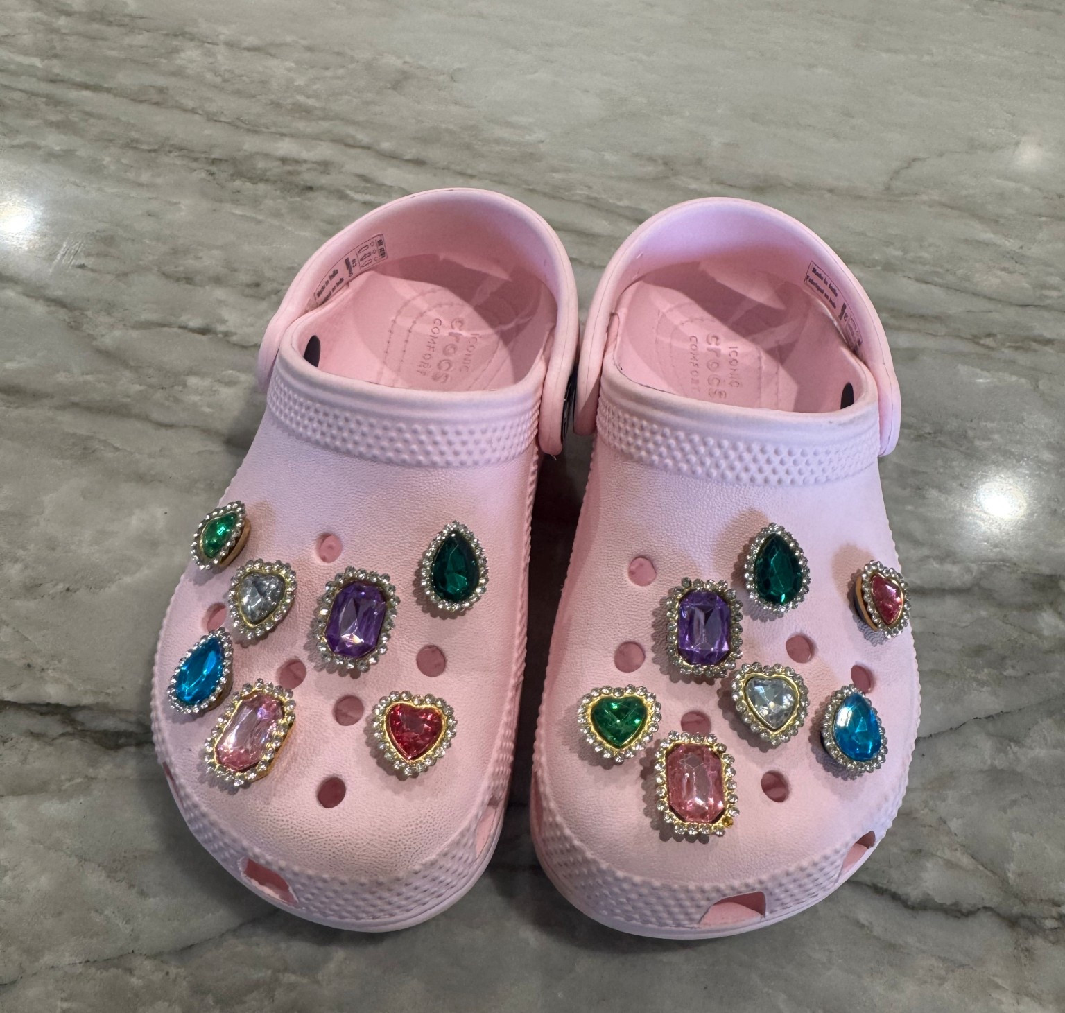 Pink girl Crocs and Croc jewel charms.

#LTKKids #LTKootd #LTKSpringSale