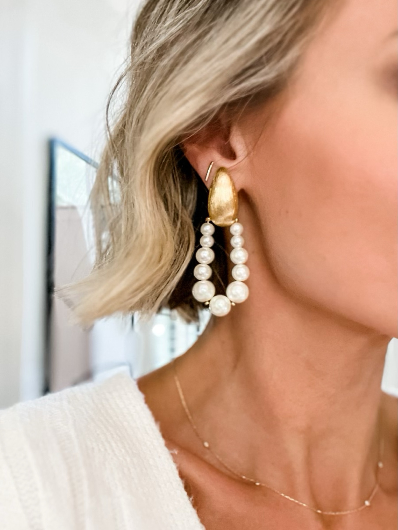 Loverly Grey in the cutest statement earring from Anthropologie! Love the pearl details! 

#LTKunder50 #LTKfit #LTKstyletip